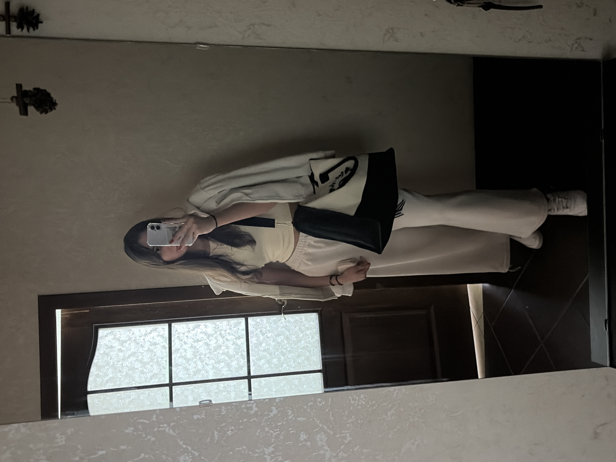 Mirror selfie in Tiraspol hallway, cream and beige fit