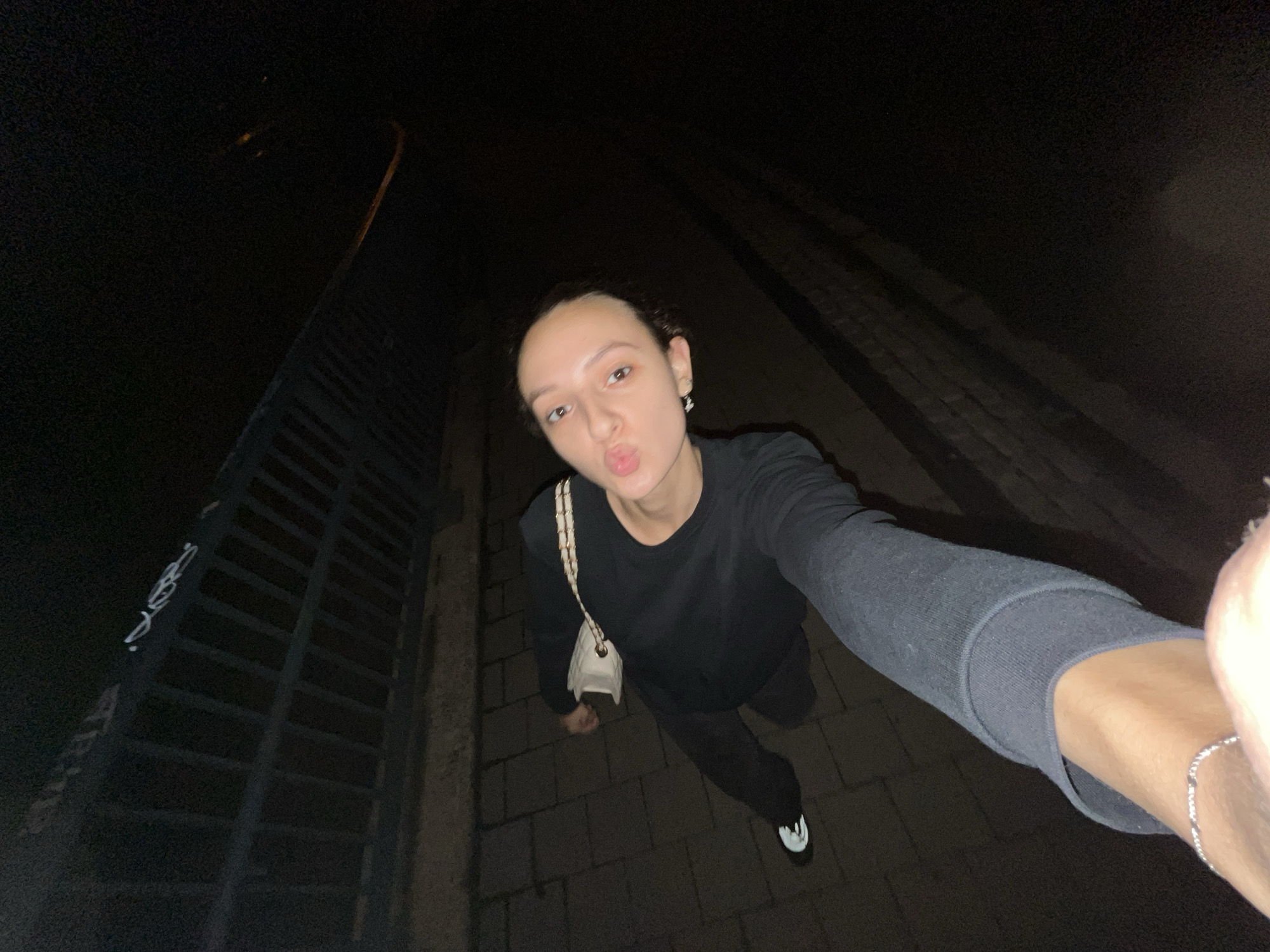 Woman documents nighttime walk through Saarbrücken in selfie series