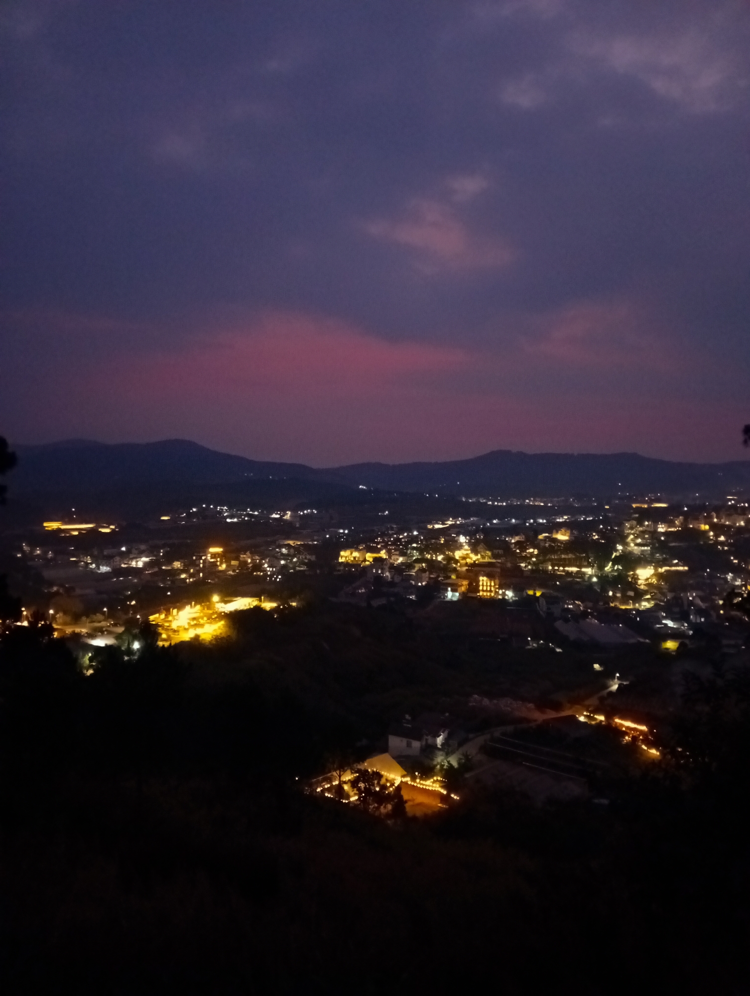 Sunset photographed over Da Lat cityscape in Vietnam