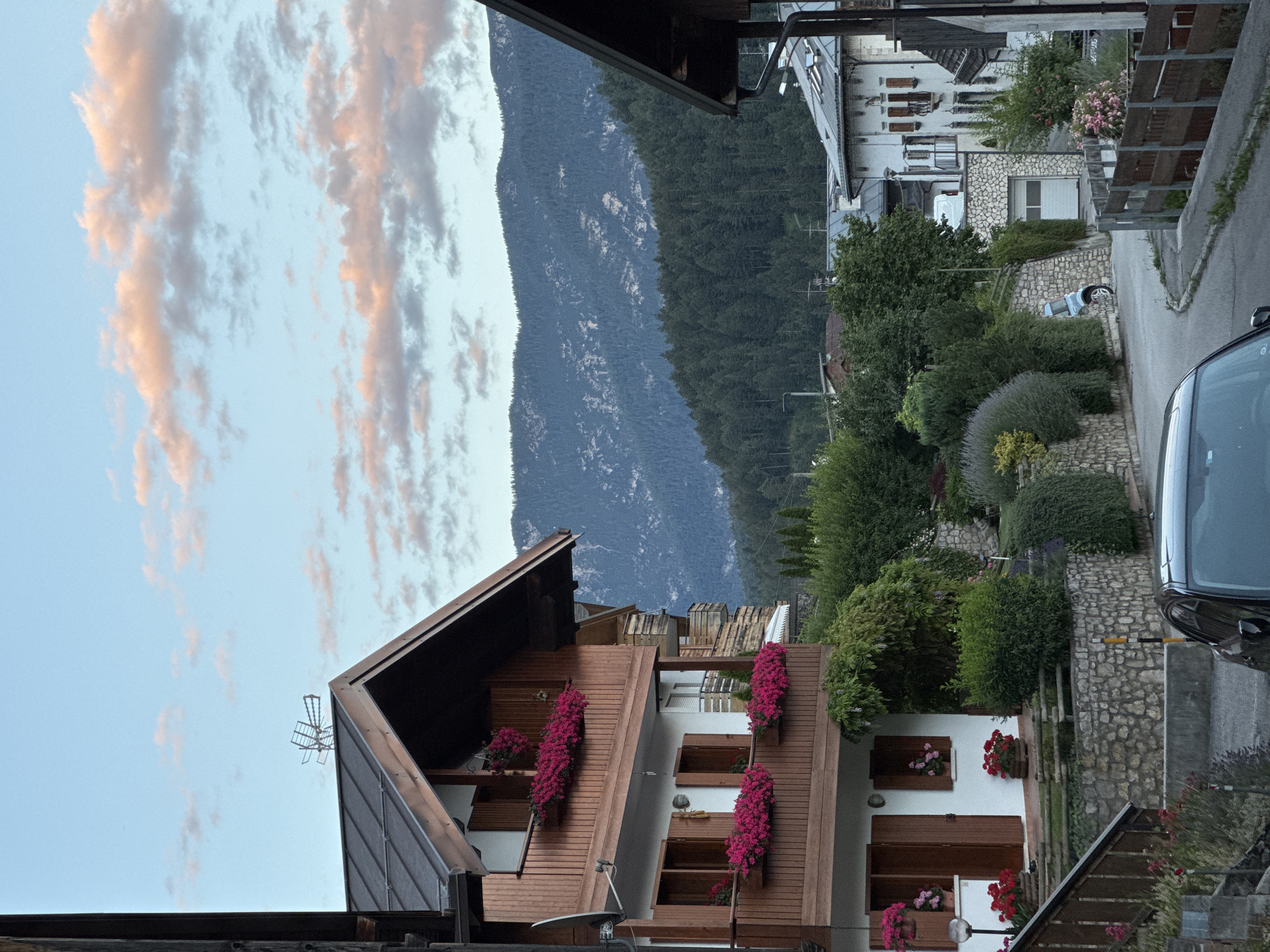Alpine village and mountain peaks at golden hour, Valle di Cadore