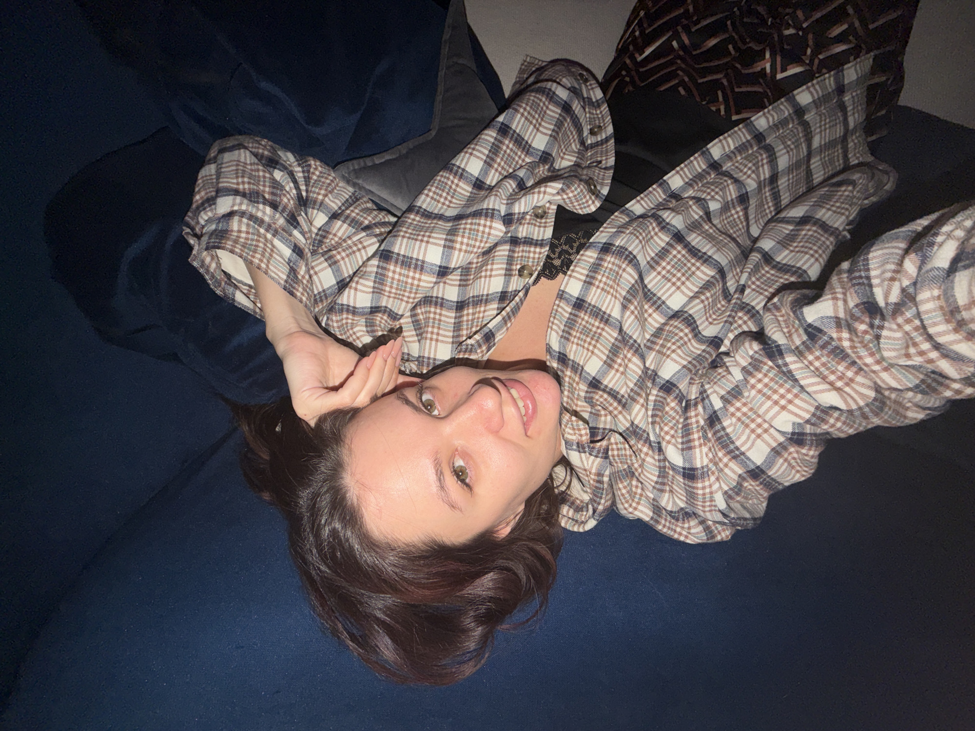 Woman photographed relaxing on couch in Belgrade apartment
