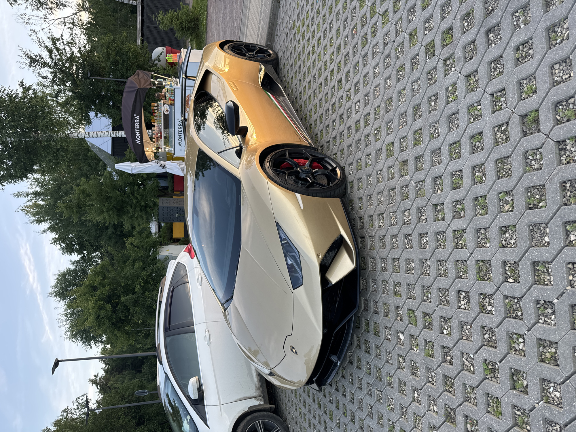 Gold Lamborghini parked up in Barvikha on a summer afternoon
