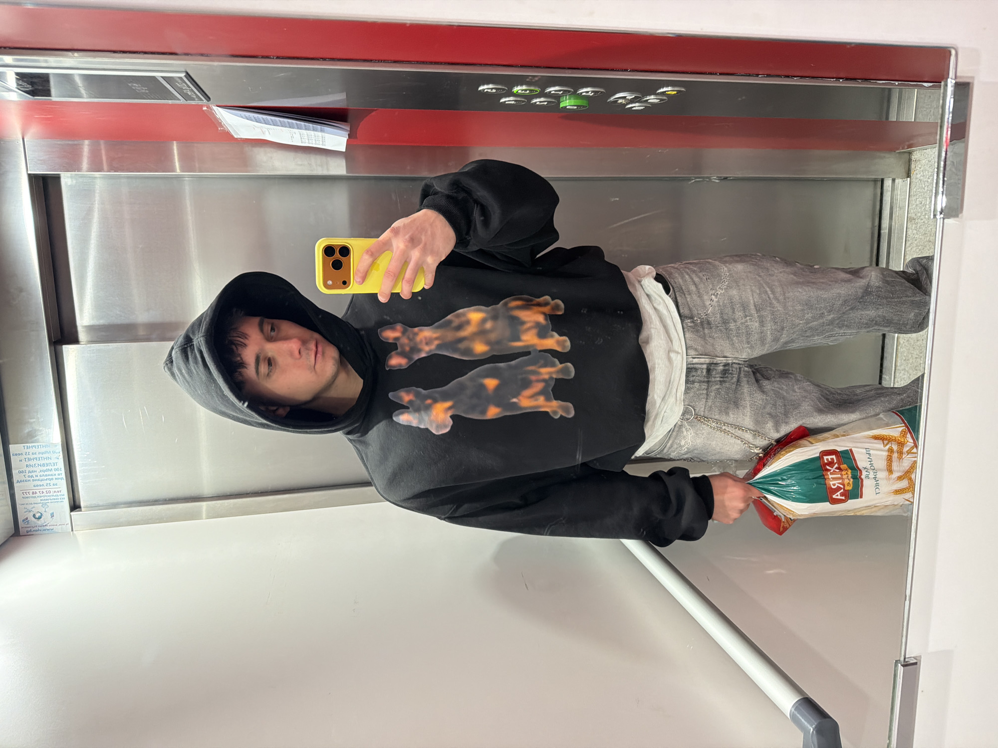 Young adult takes multiple selfies in Sofia locations