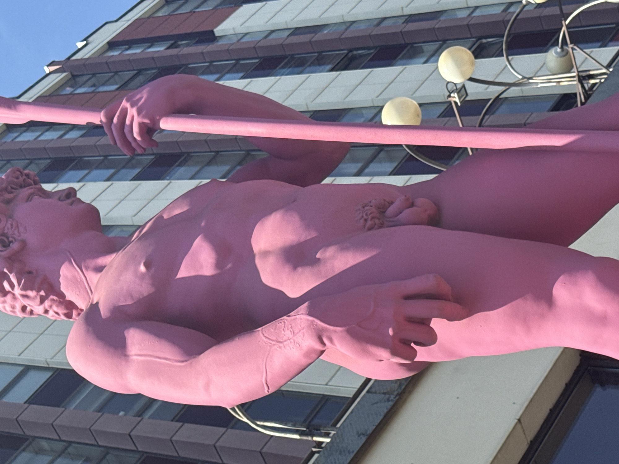 Pink David statue and street bikes in Zhabkino, Russia