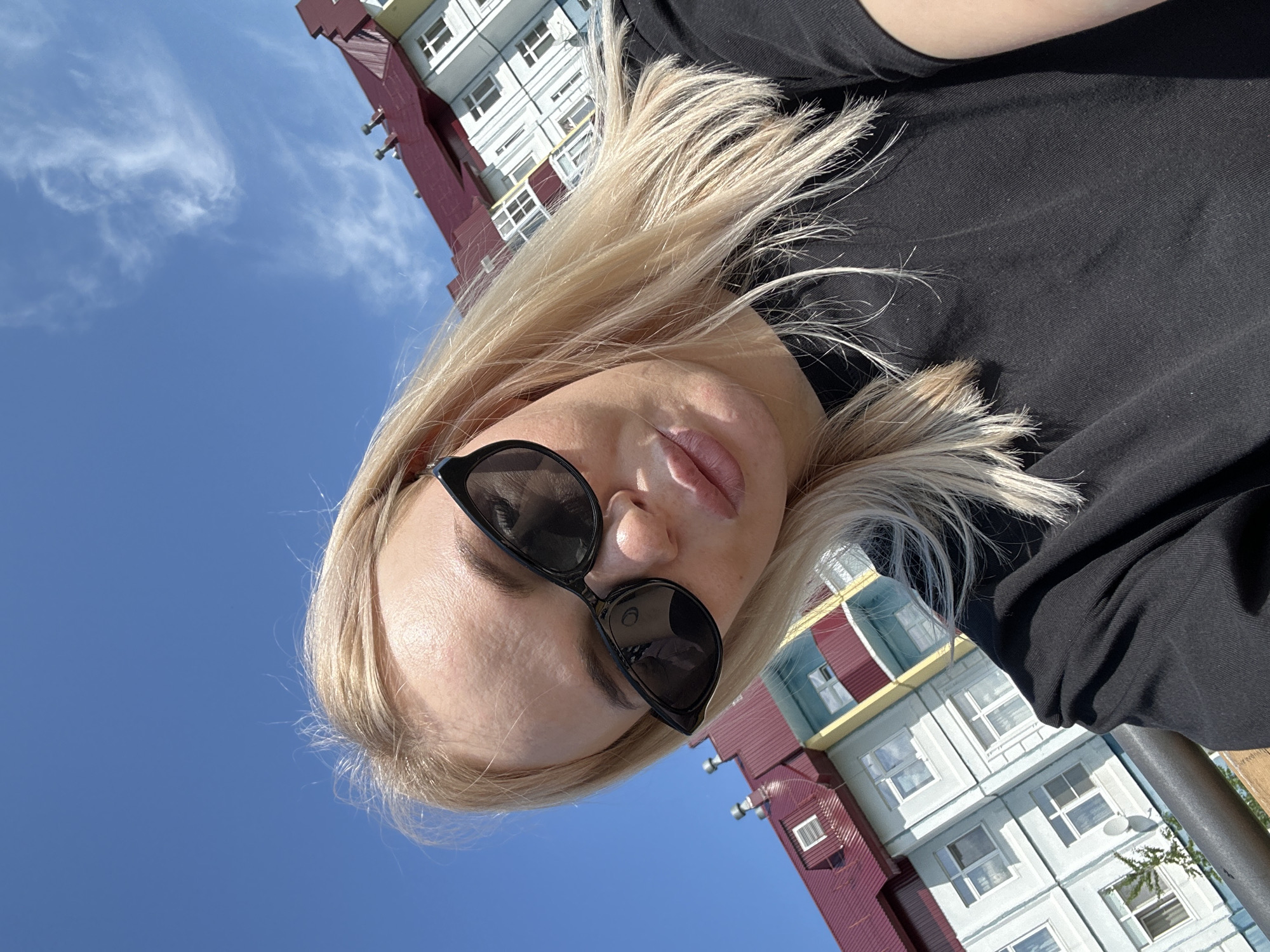 Woman documents morning outing with selfies across city locations