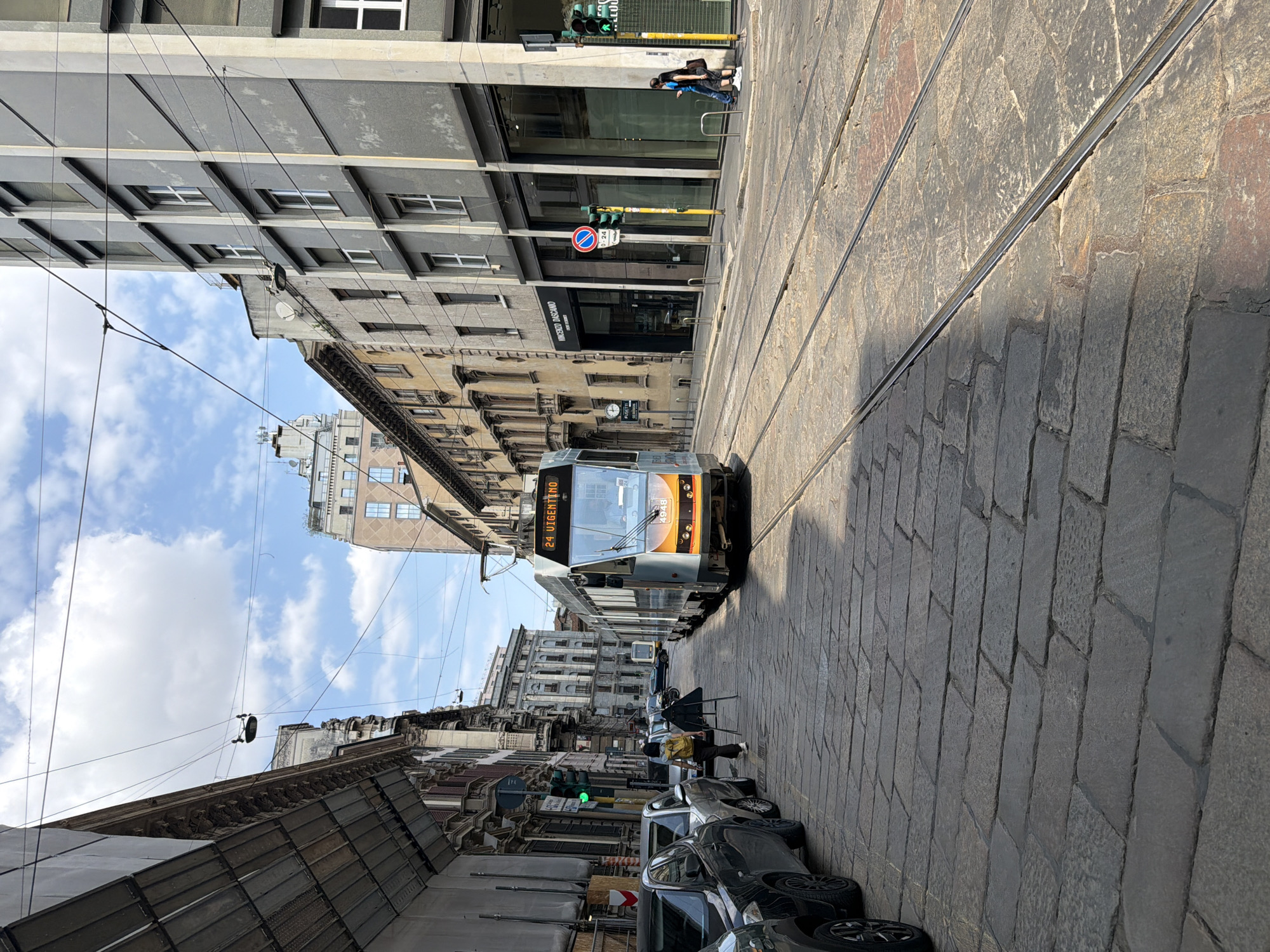 Two Milan tram routes passing through the city streets