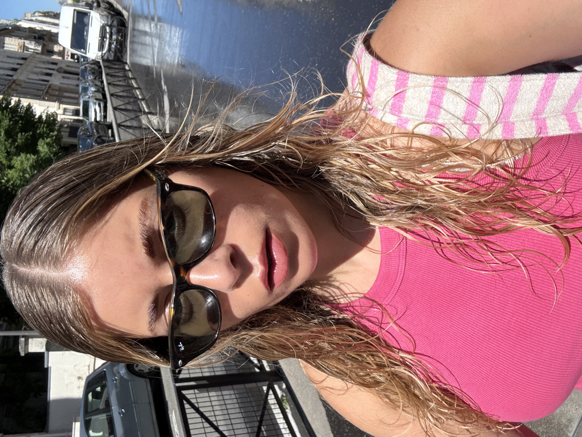 Woman with wet hair photographed on Paris street