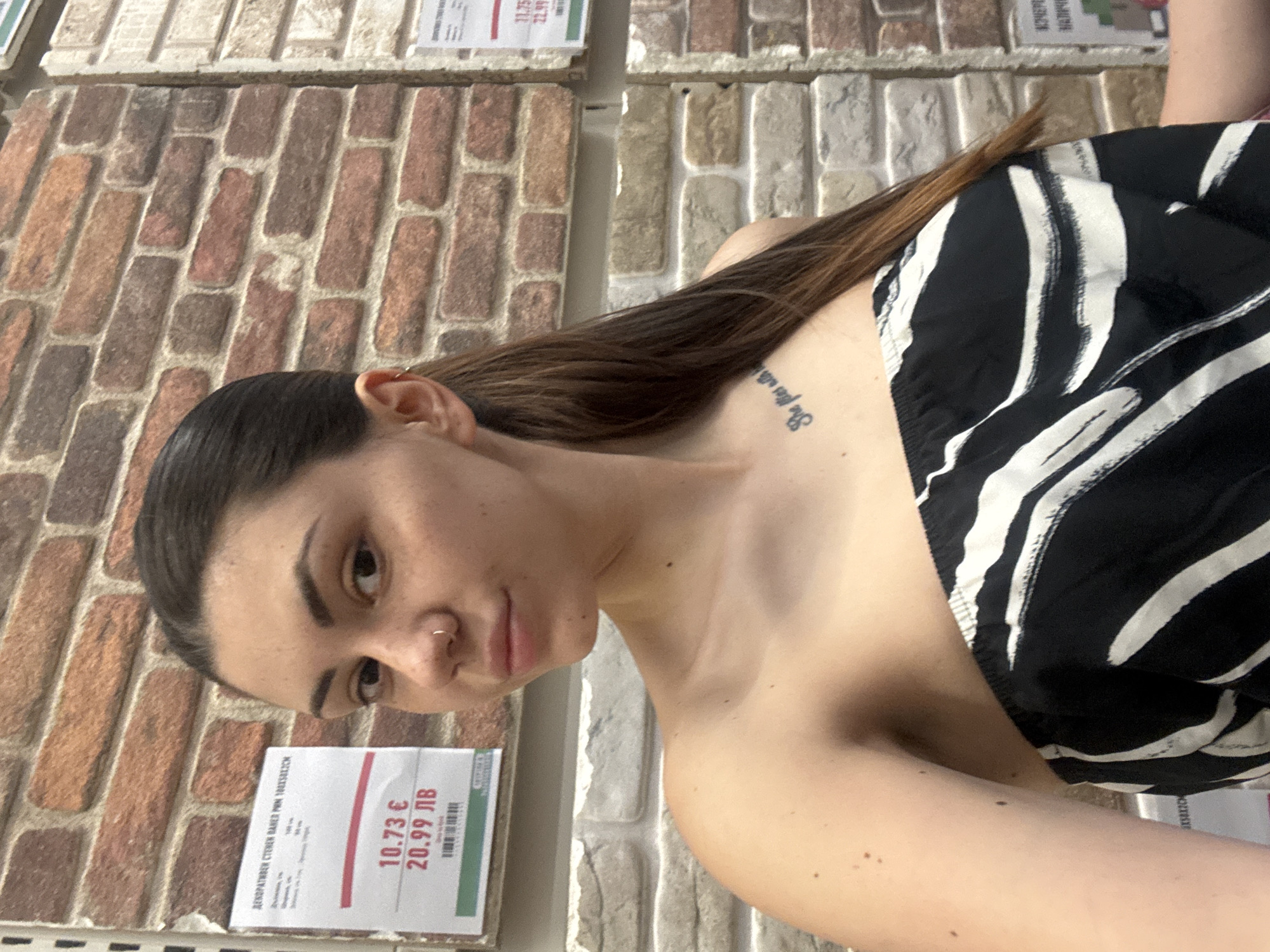 Woman poses for photos in Sofia retail store