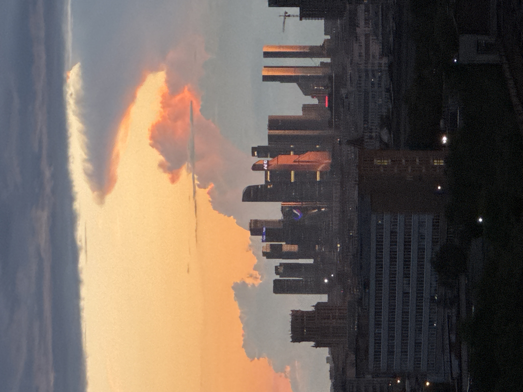 Moscow skyline at golden hour, Ostankino tower in silhouette