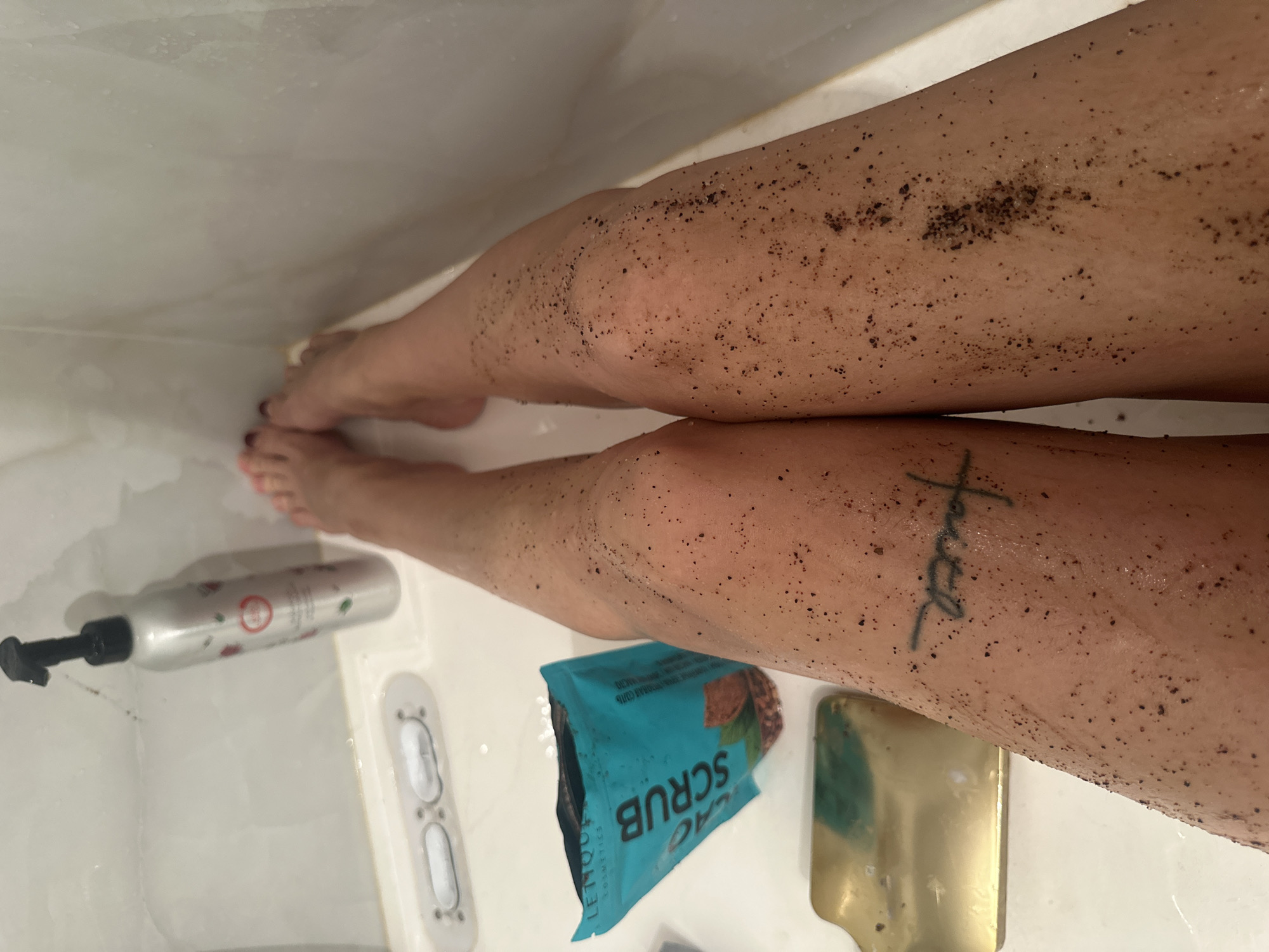 Person bathing with dark particles in Gavrilkovo shower