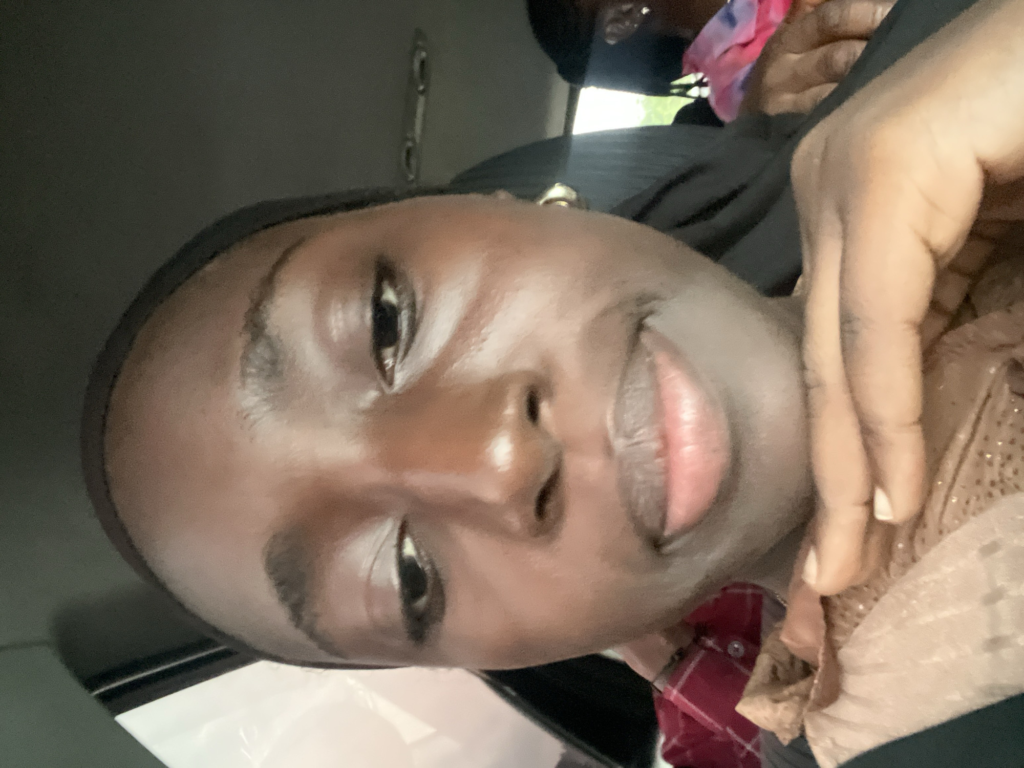 Person takes car selfie in Karum, Nigeria