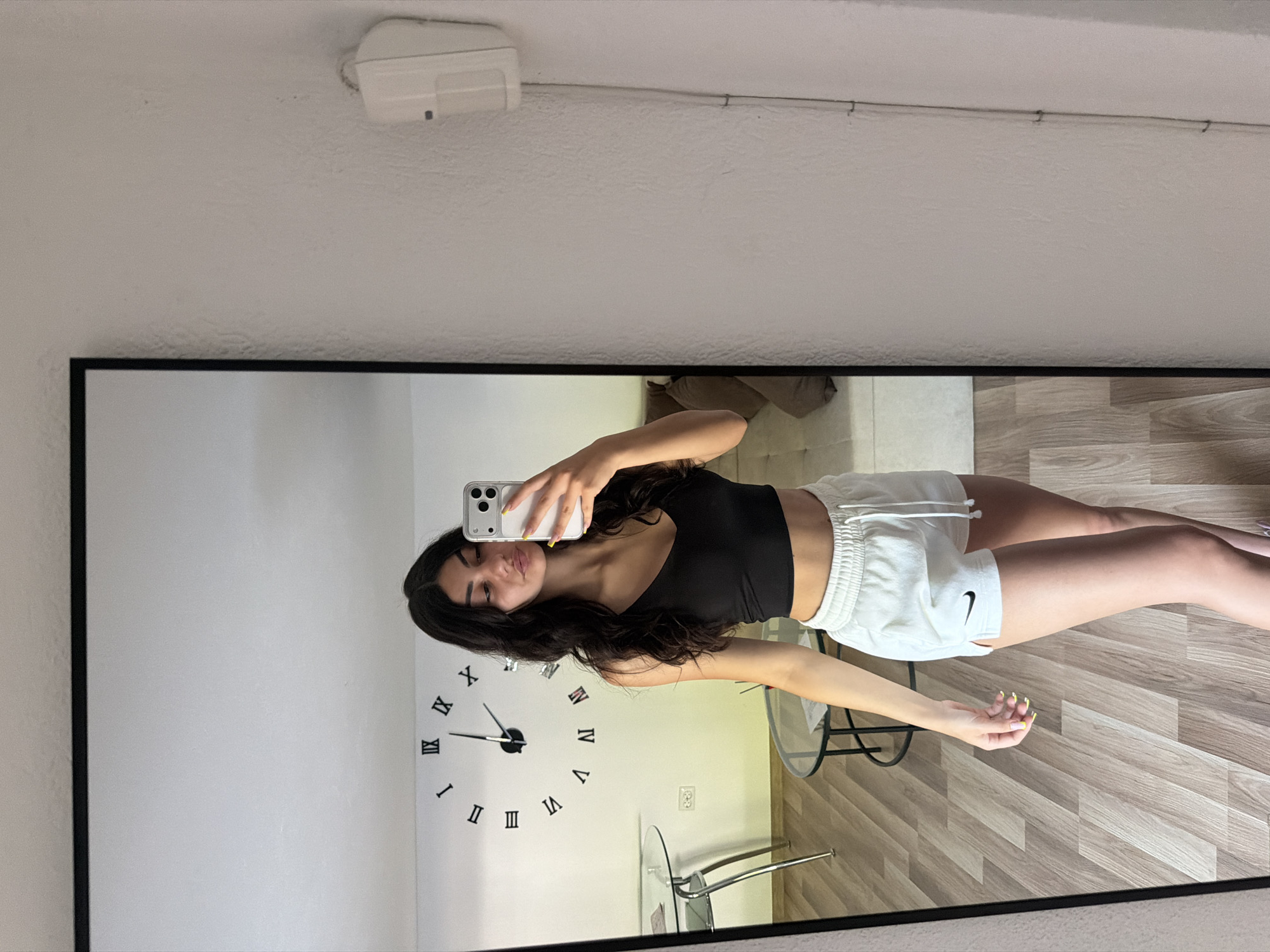 Woman takes multiple mirror selfies in Gabrovo, Bulgaria