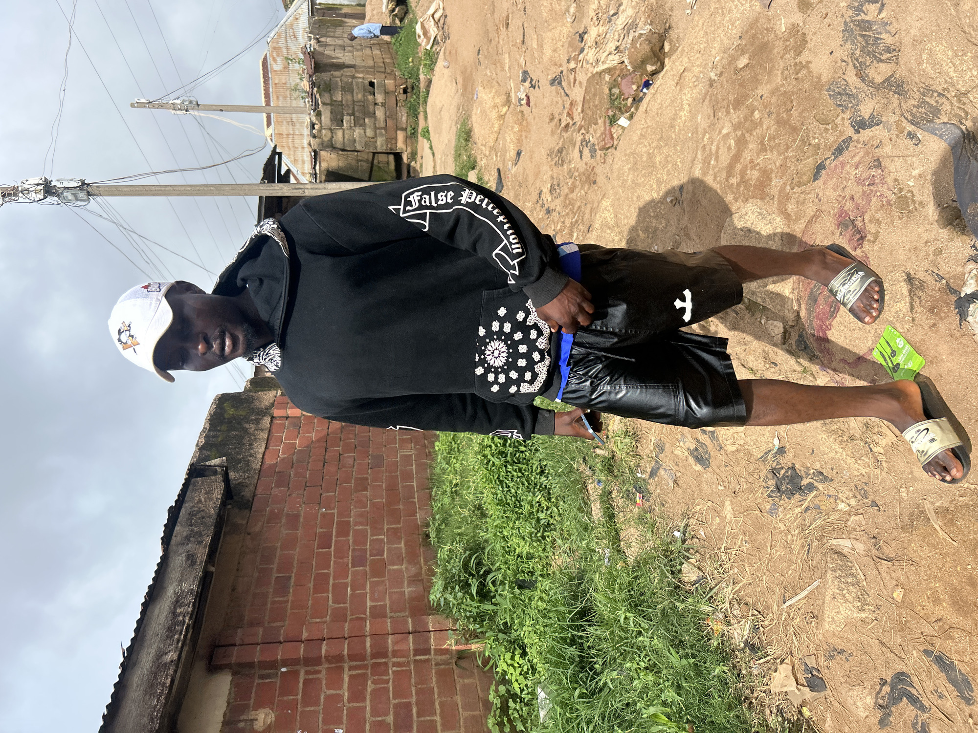 Everyday moments around an outdoor compound in Jos, Nigeria