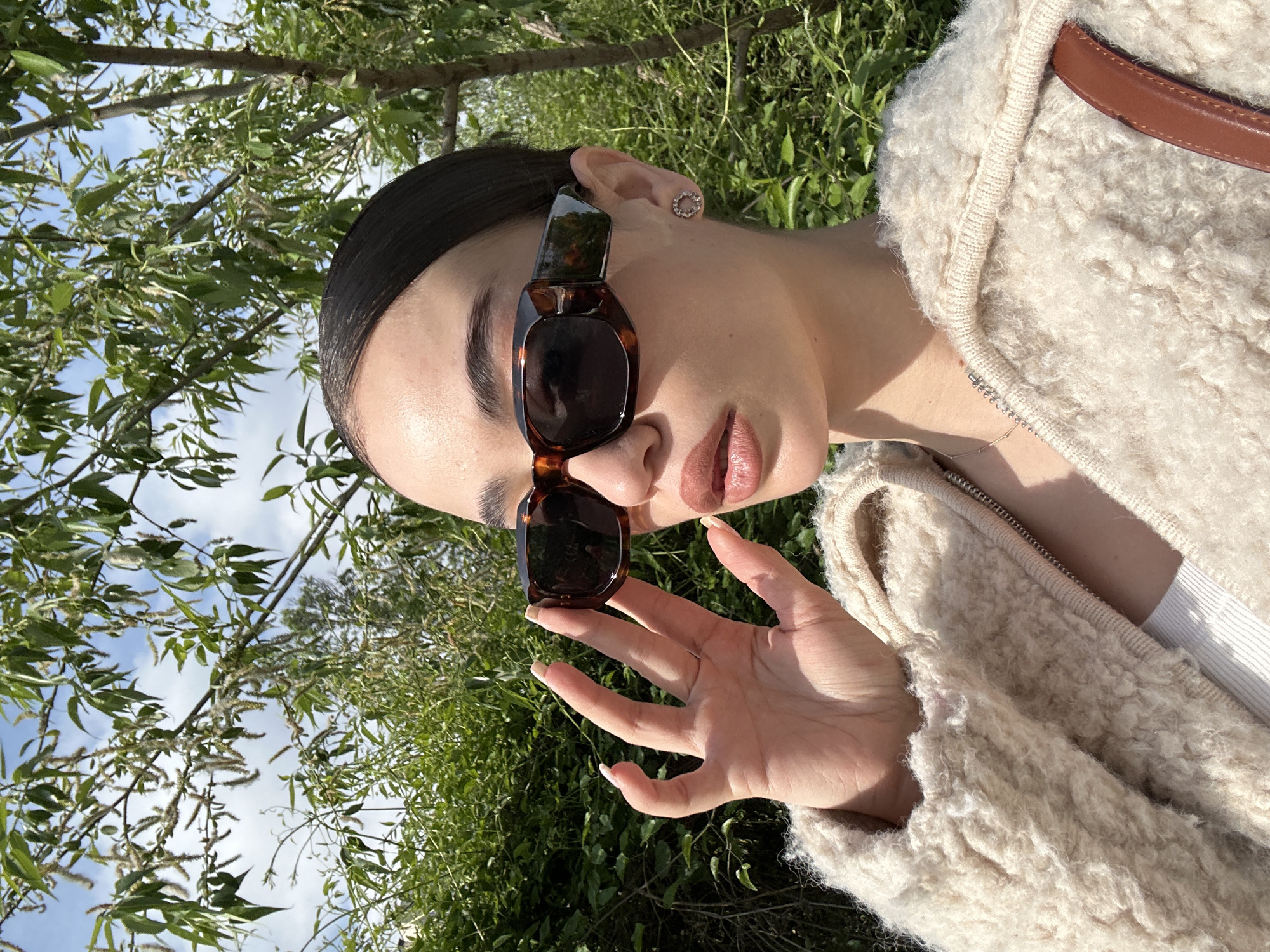 Woman in sunglasses and cream jacket spotted in Sofia