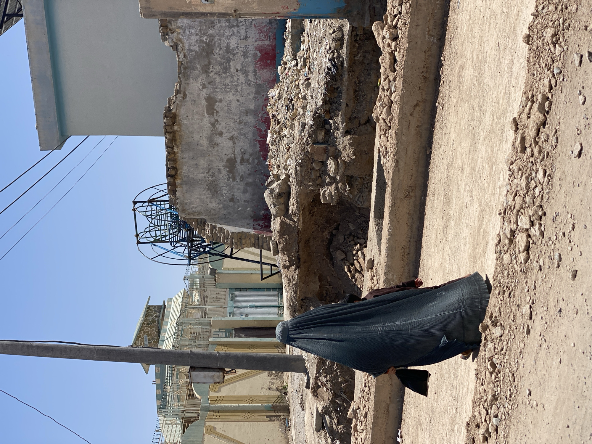 Everyday street life in Kandahar on a clear summer morning