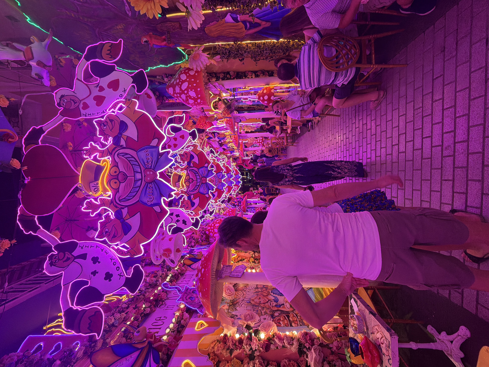 Alice in Wonderland-themed neon district lights up Athens night