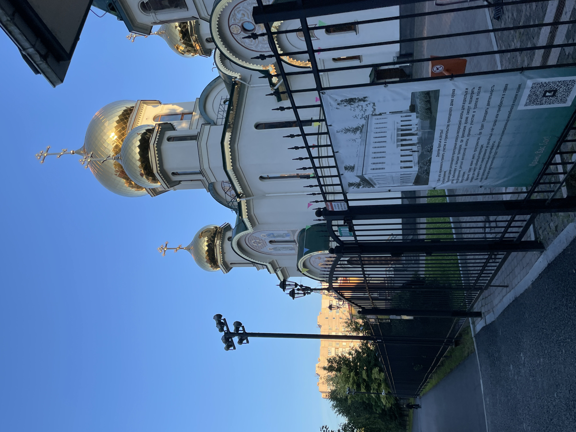 Orthodox churches, birch trees, and street scenes at a Saint Petersburg cemetery
