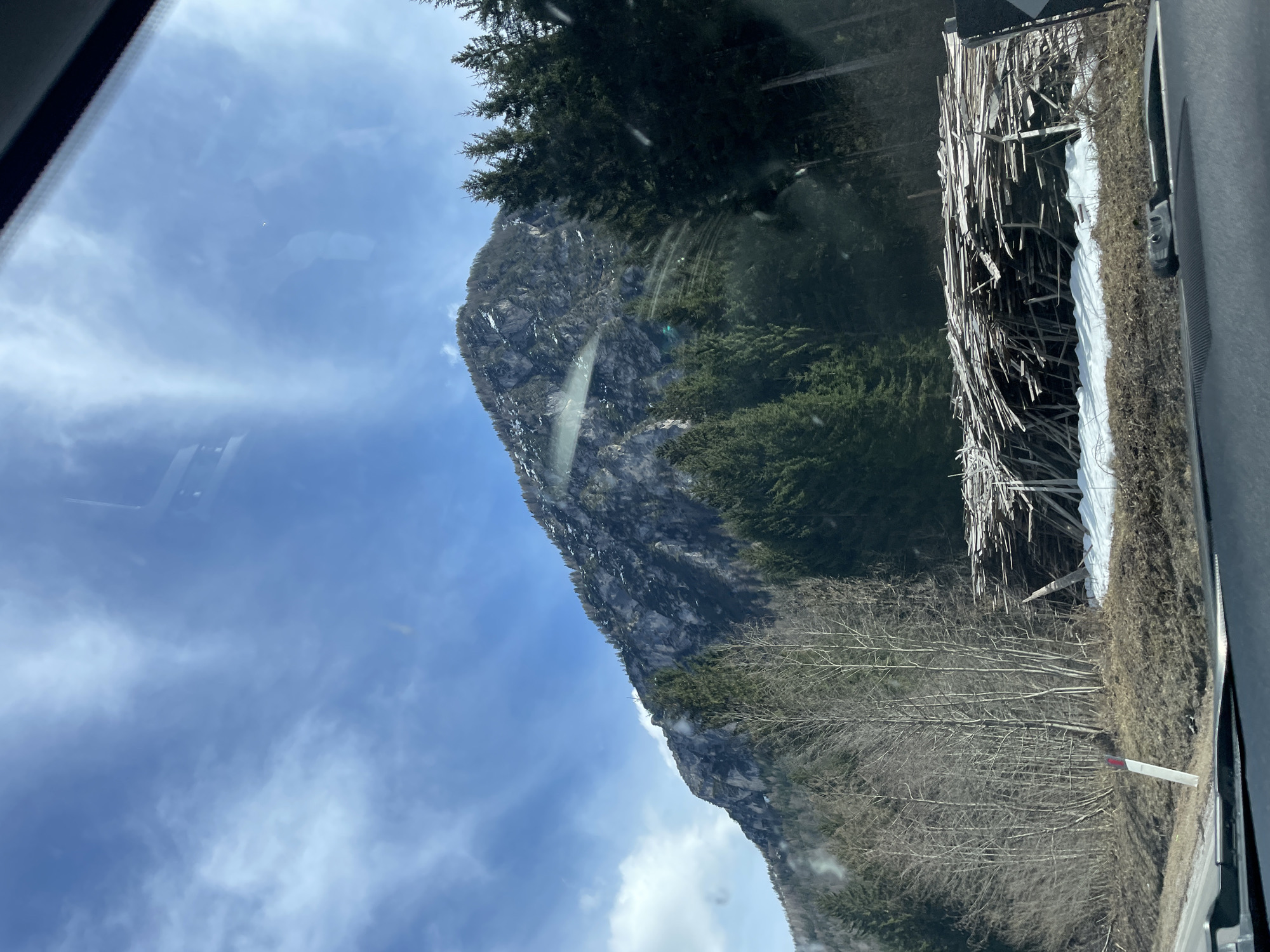 Driver captures scenic mountain views during Italian Alps journey