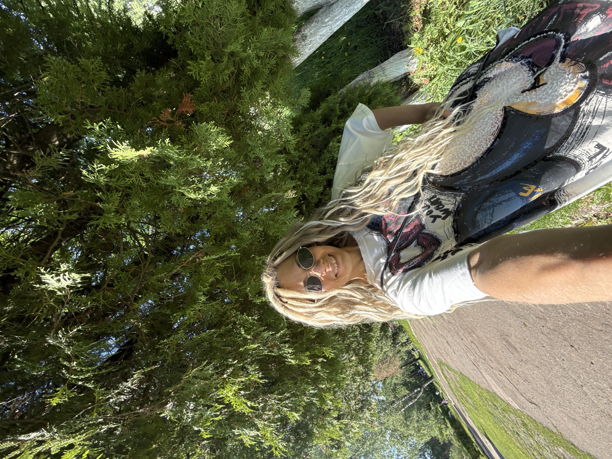 Woman photographed smiling in park in Шебунино, Russia