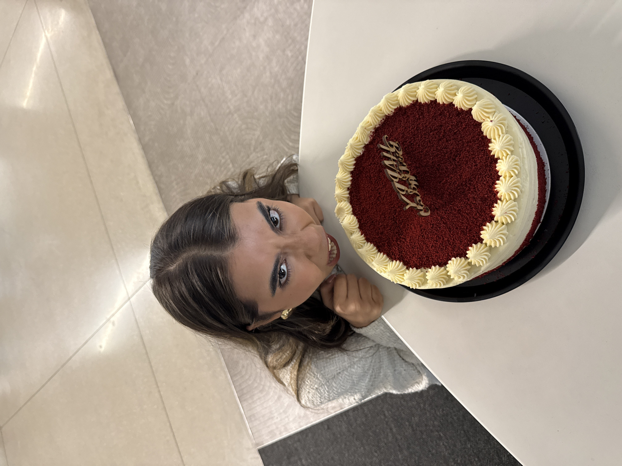 Birthday cake celebration captured in Mexico City indoor gathering