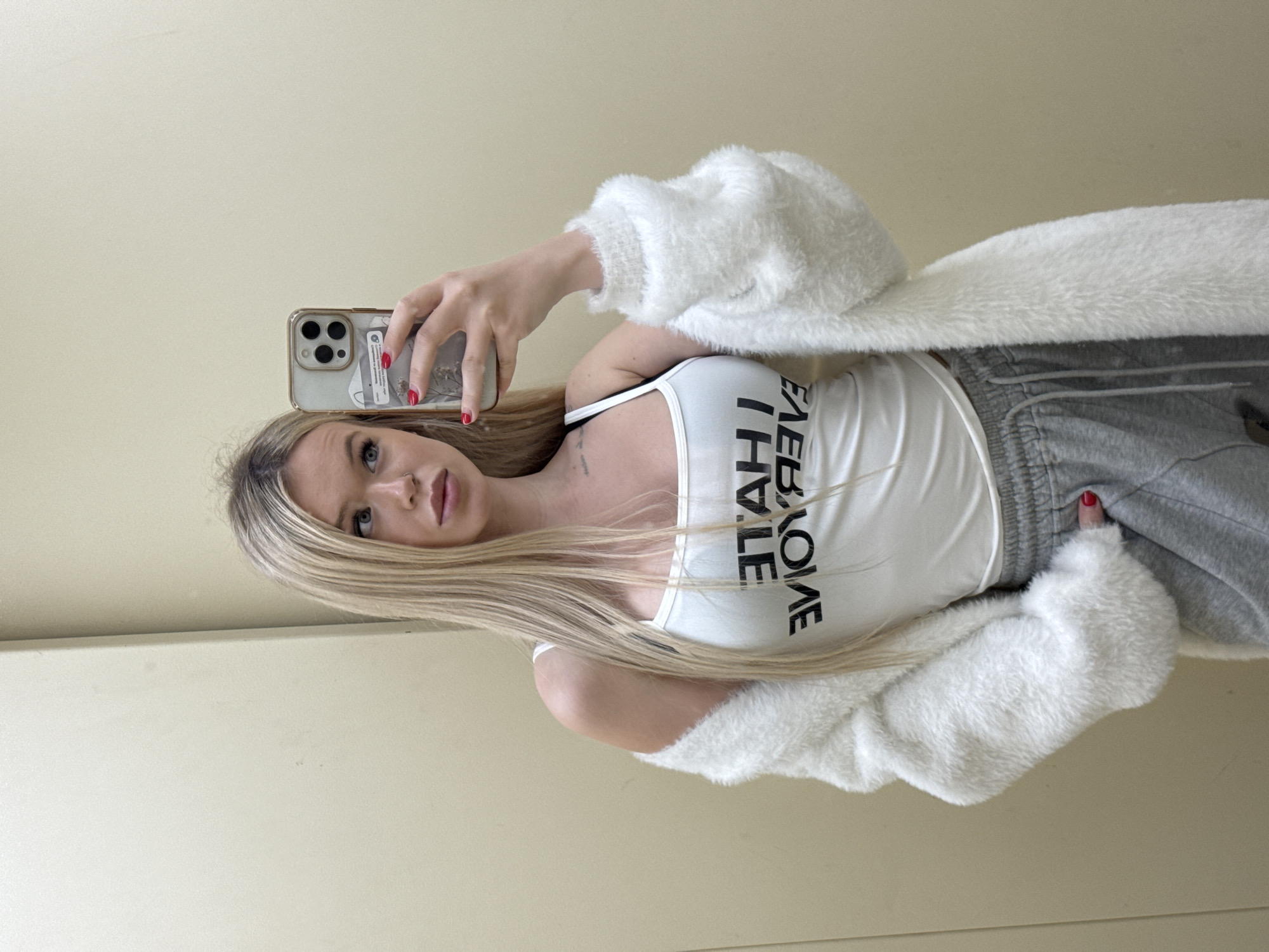 Fitting room and elevator selfies in Saint Petersburg, same outfit