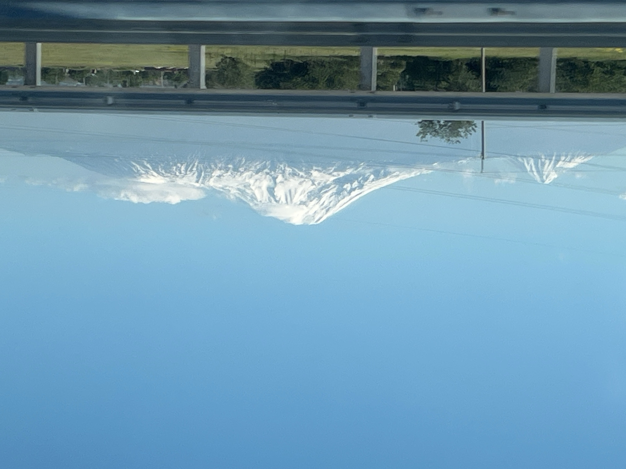 Mount Ararat reflection captured in vehicle windshield near Parpi