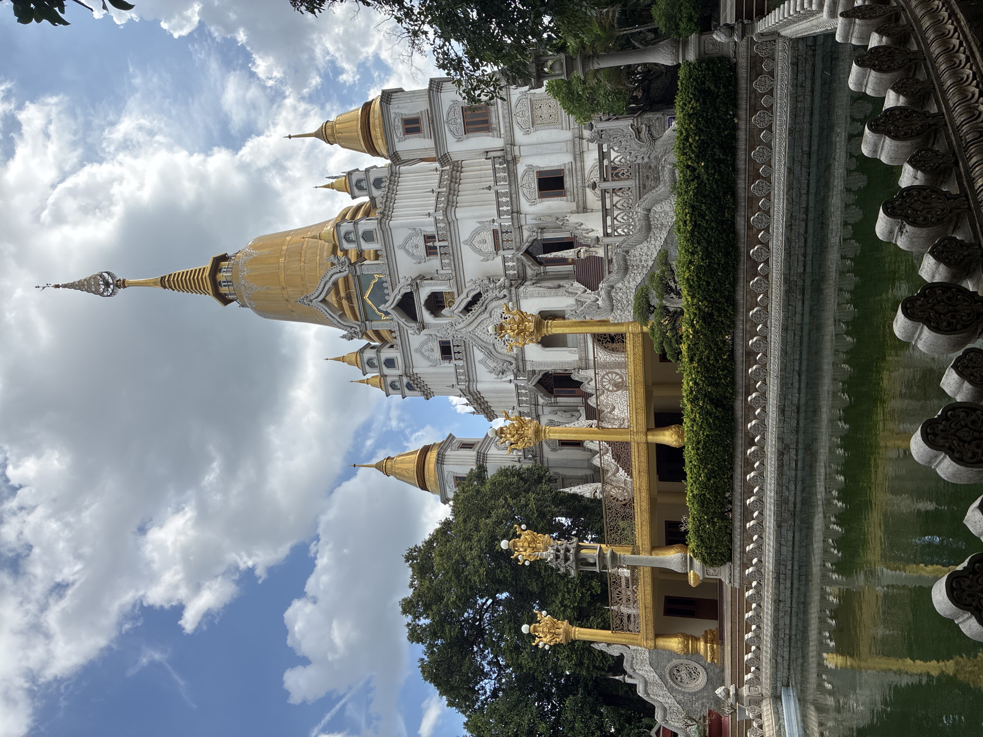 Ornate Buddhist temple with golden stupas in Dĩ An, Vietnam
