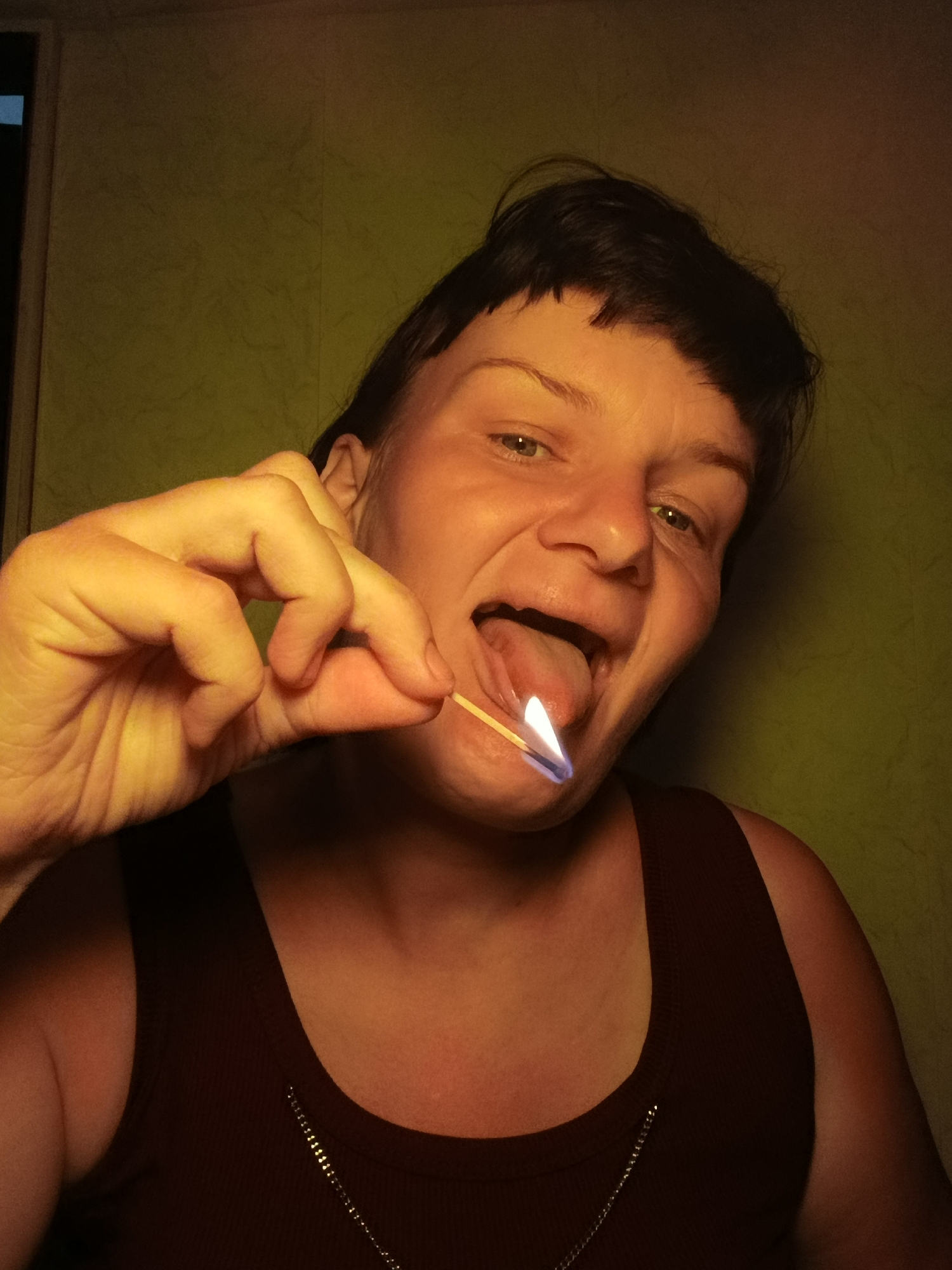 Woman poses with household items in Russian town morning session