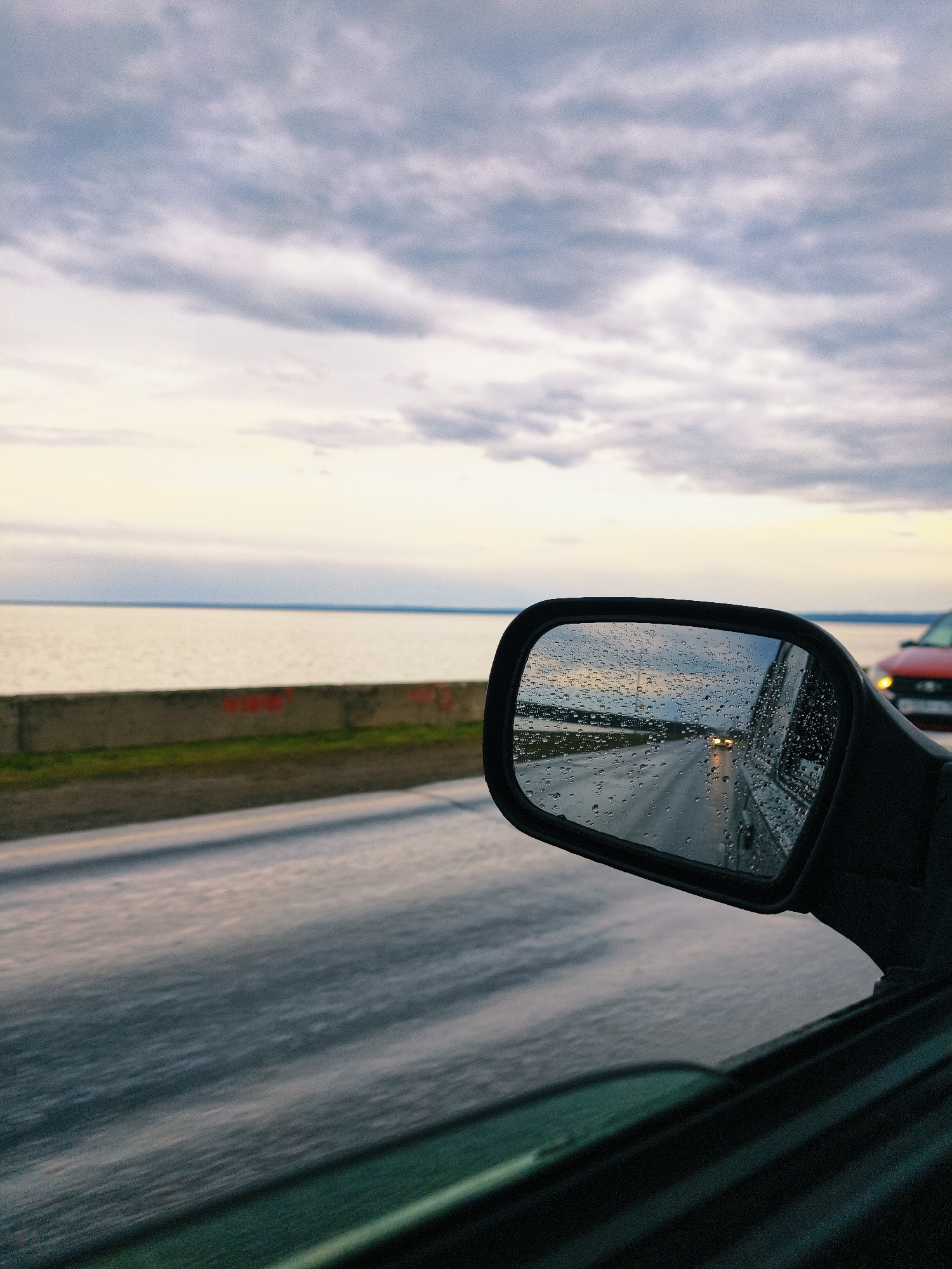 Rainy car journey documented in Chaikovsky, Russia