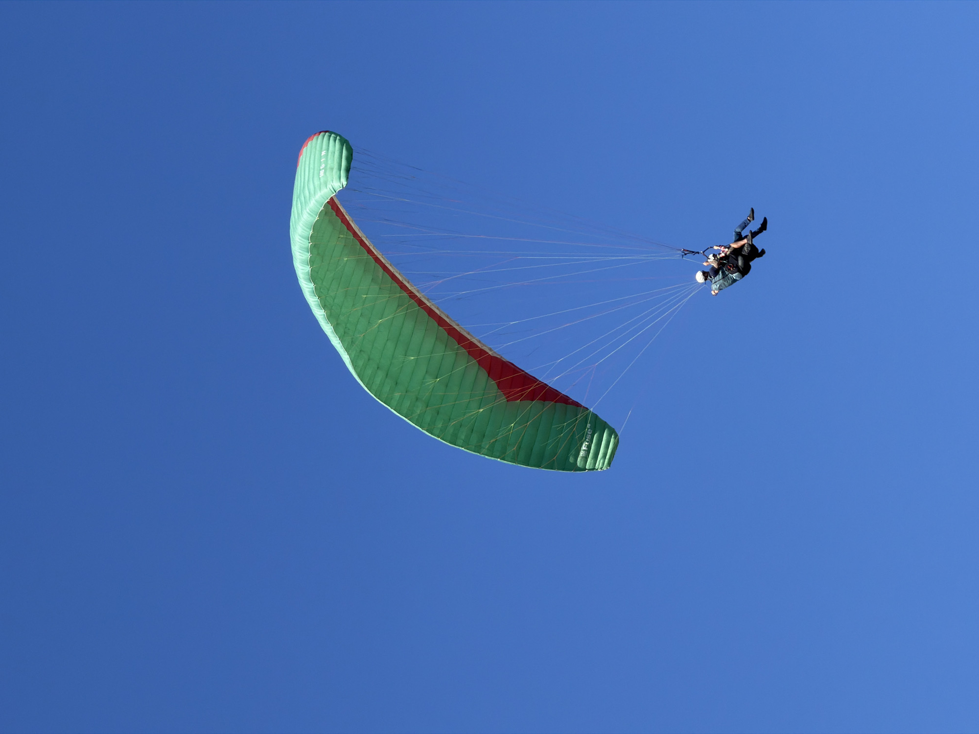 Tandem paragliding session documented near Table Mountain, Cape Town