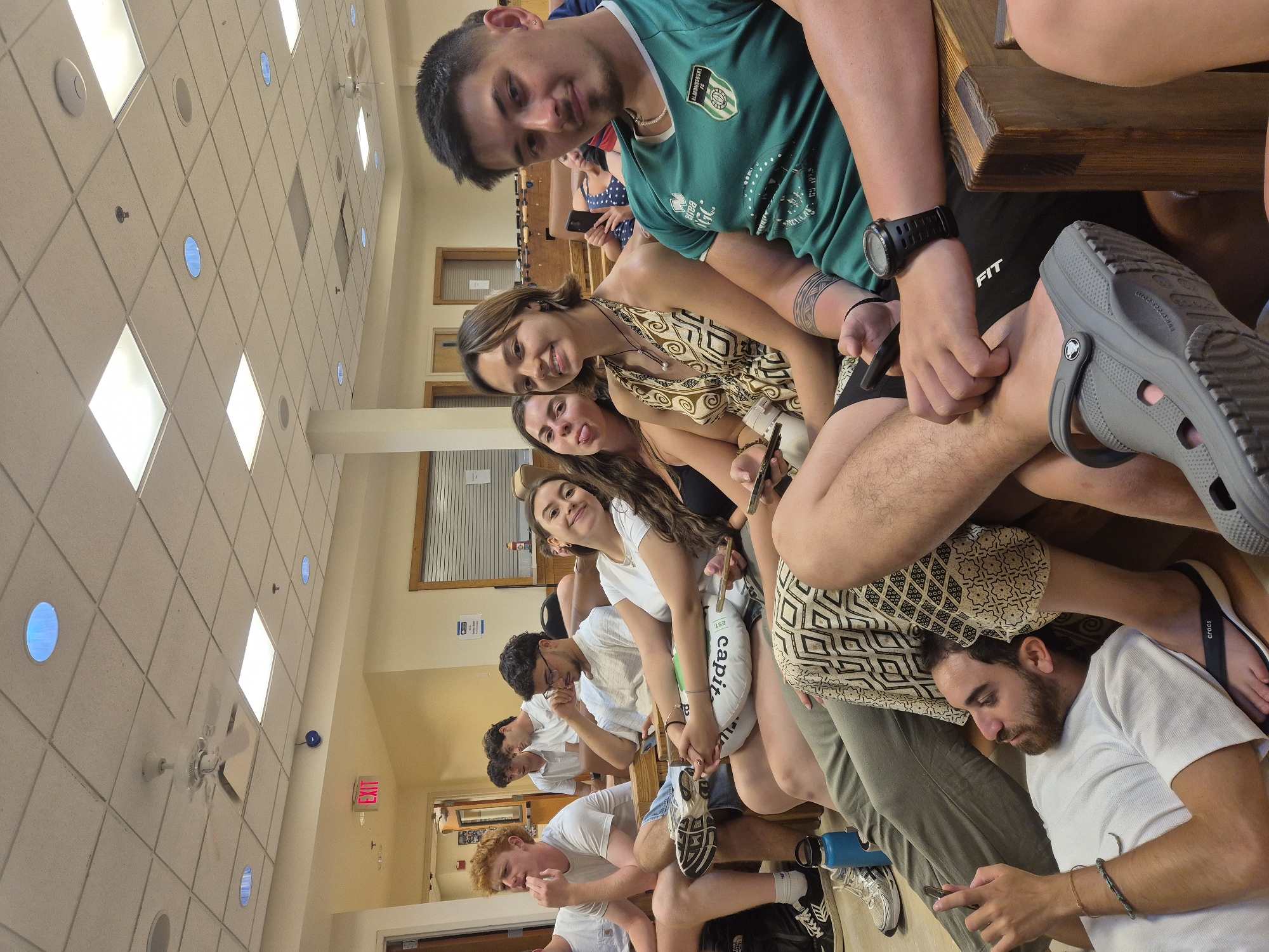 Young adults watch USA-Paraguay soccer match in Washington Township lounge