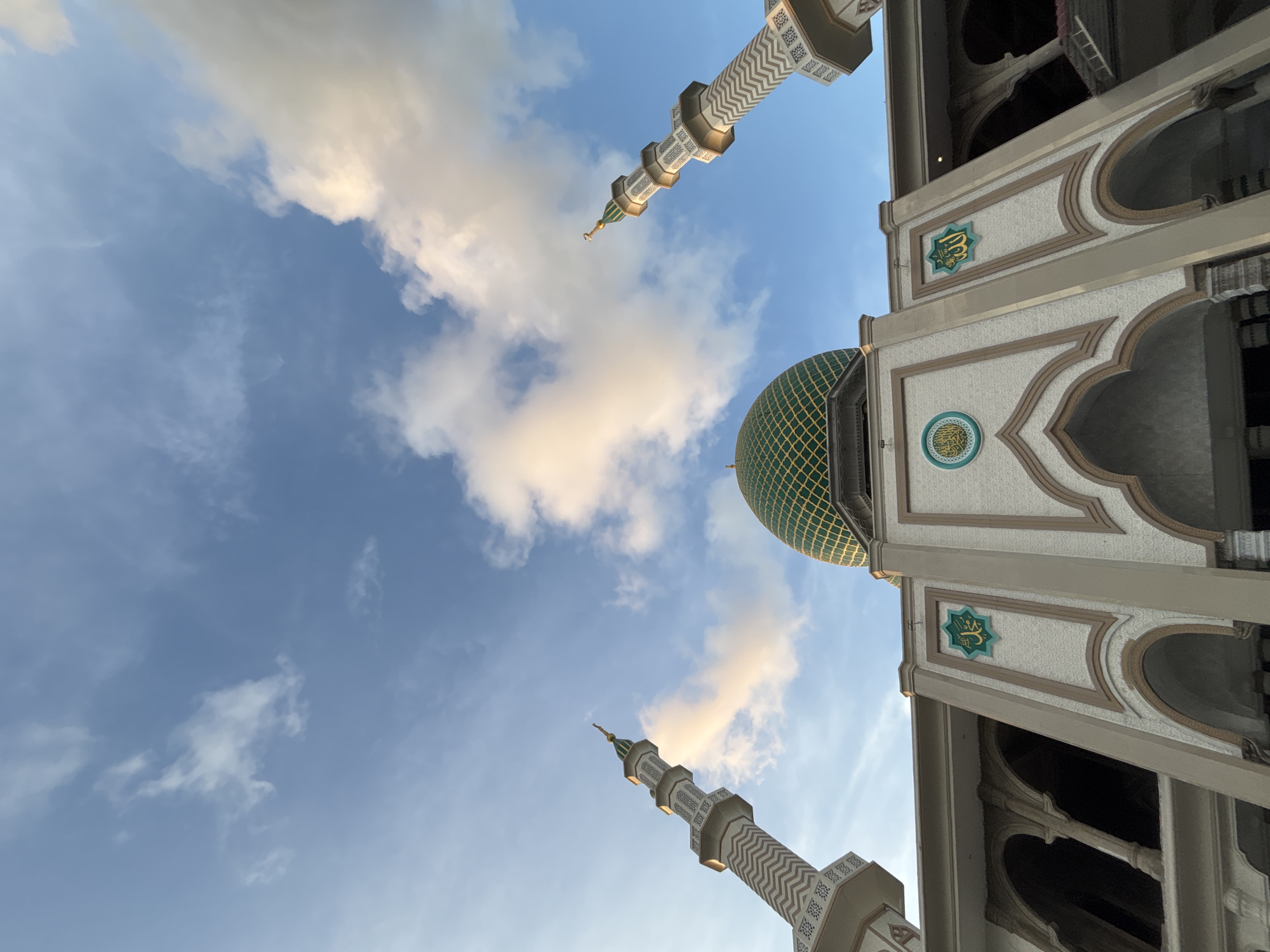 Mosque with green dome photographed in Lhokseumawe, Indonesia