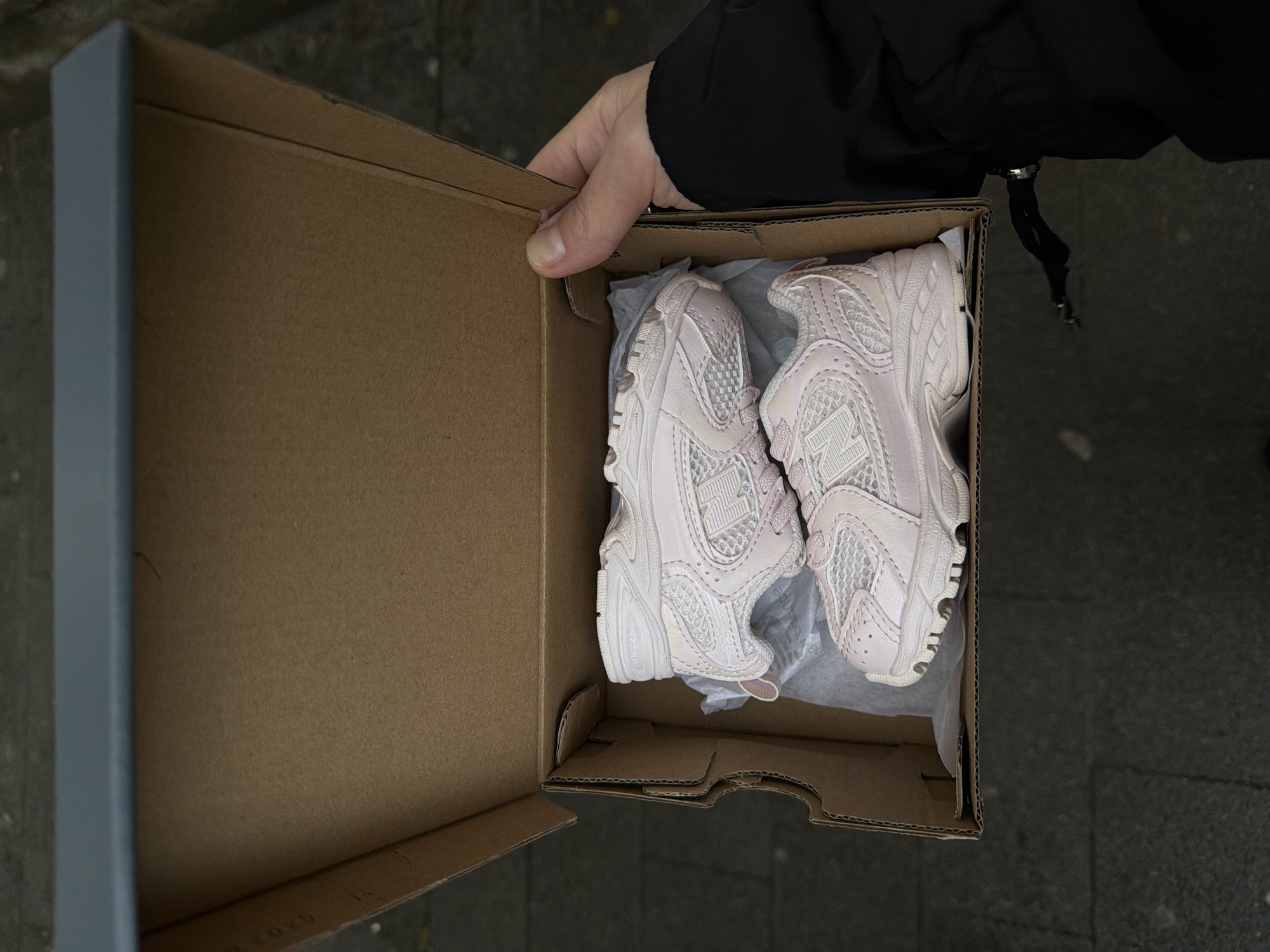 Shopper with pink sneakers and Frappuccino spotted in Santiago