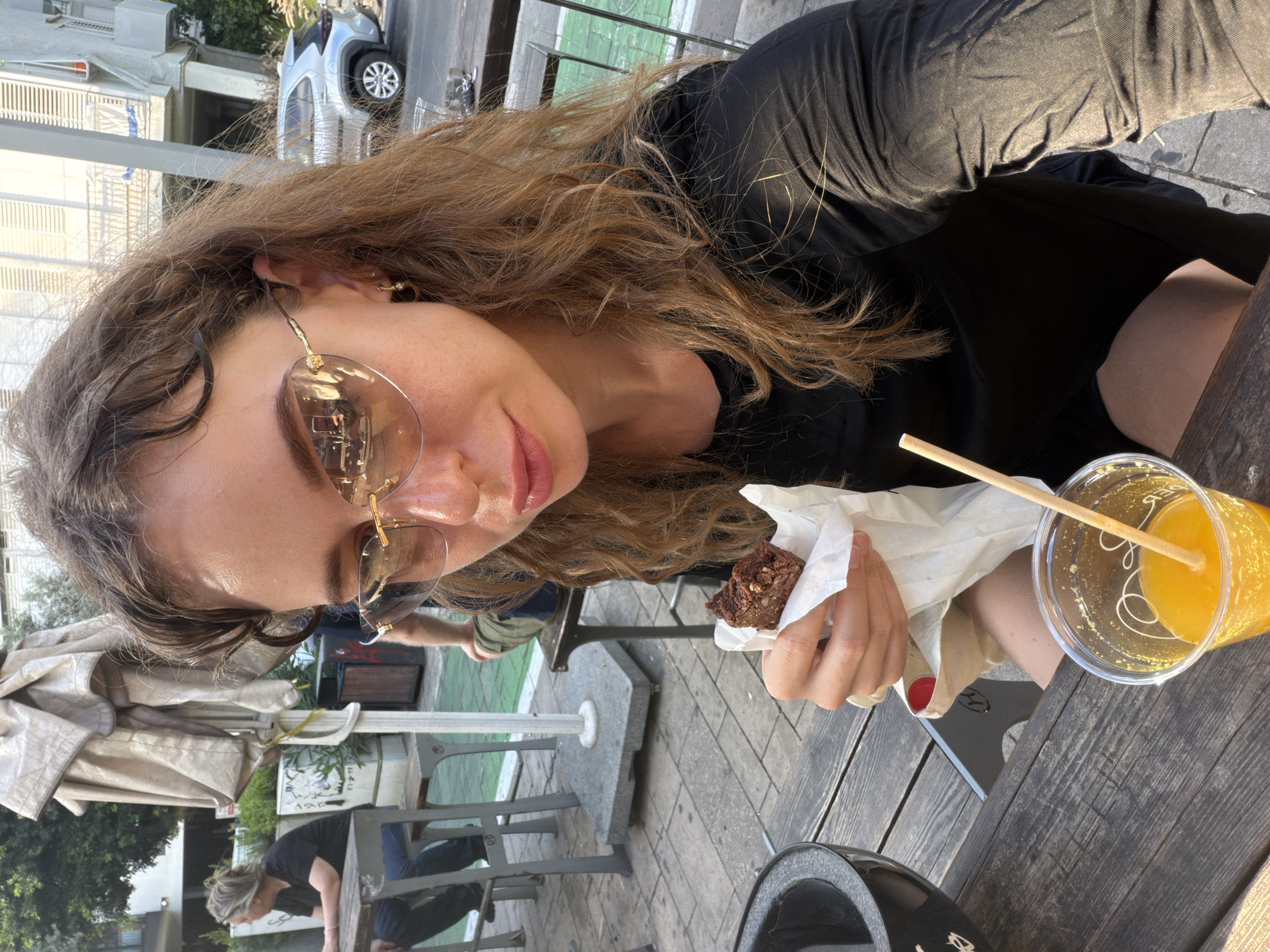 Afternoon brownie break at an outdoor table in Tel Aviv
