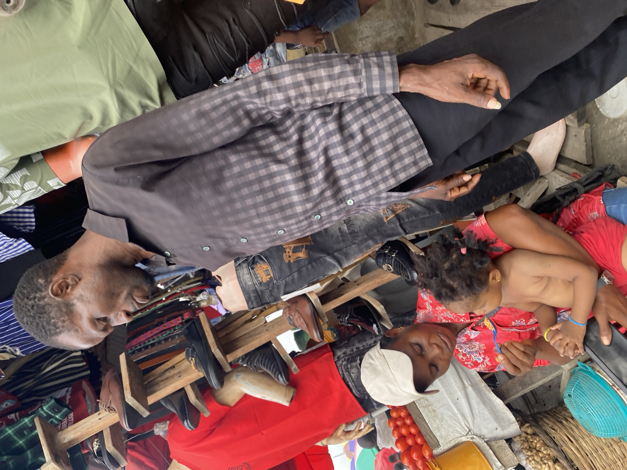 Ordinary marketplace life documented across Lagos area locations