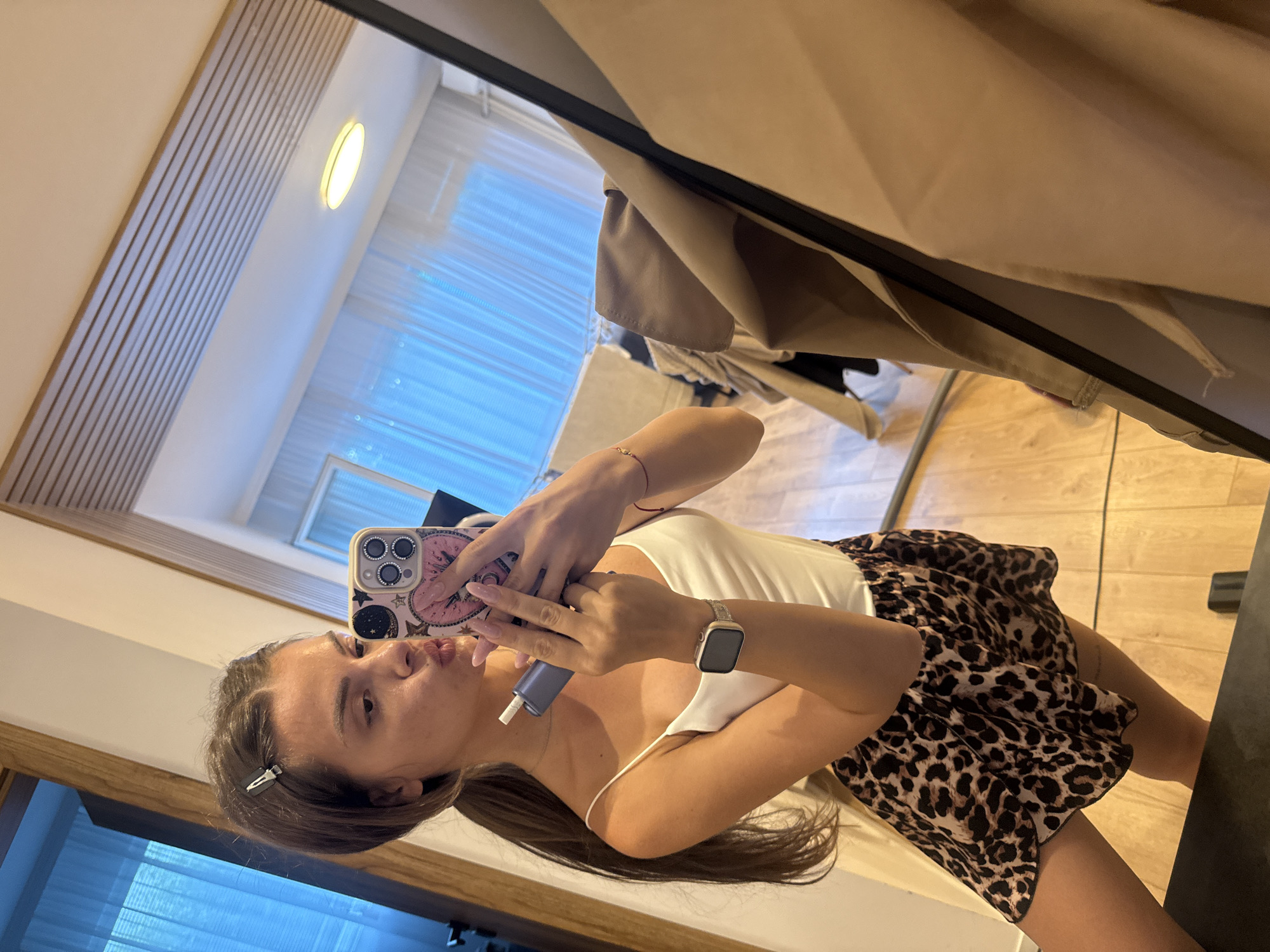 Woman documents selfie session in Plovdiv apartment Tuesday afternoon