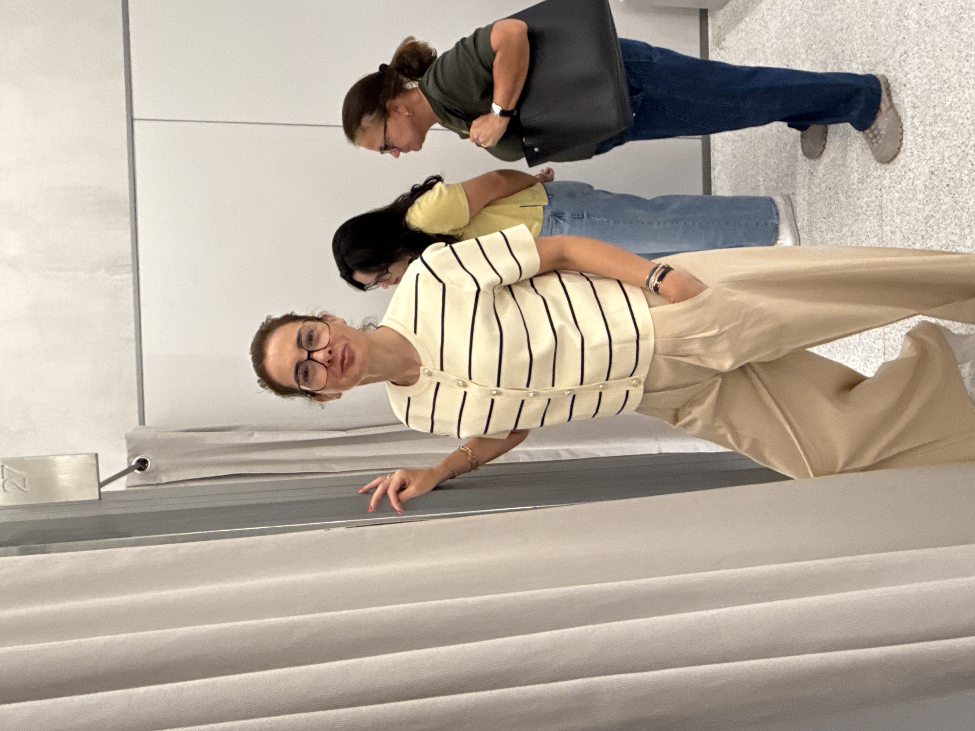 Women try on clothes in Matosinhos retail store