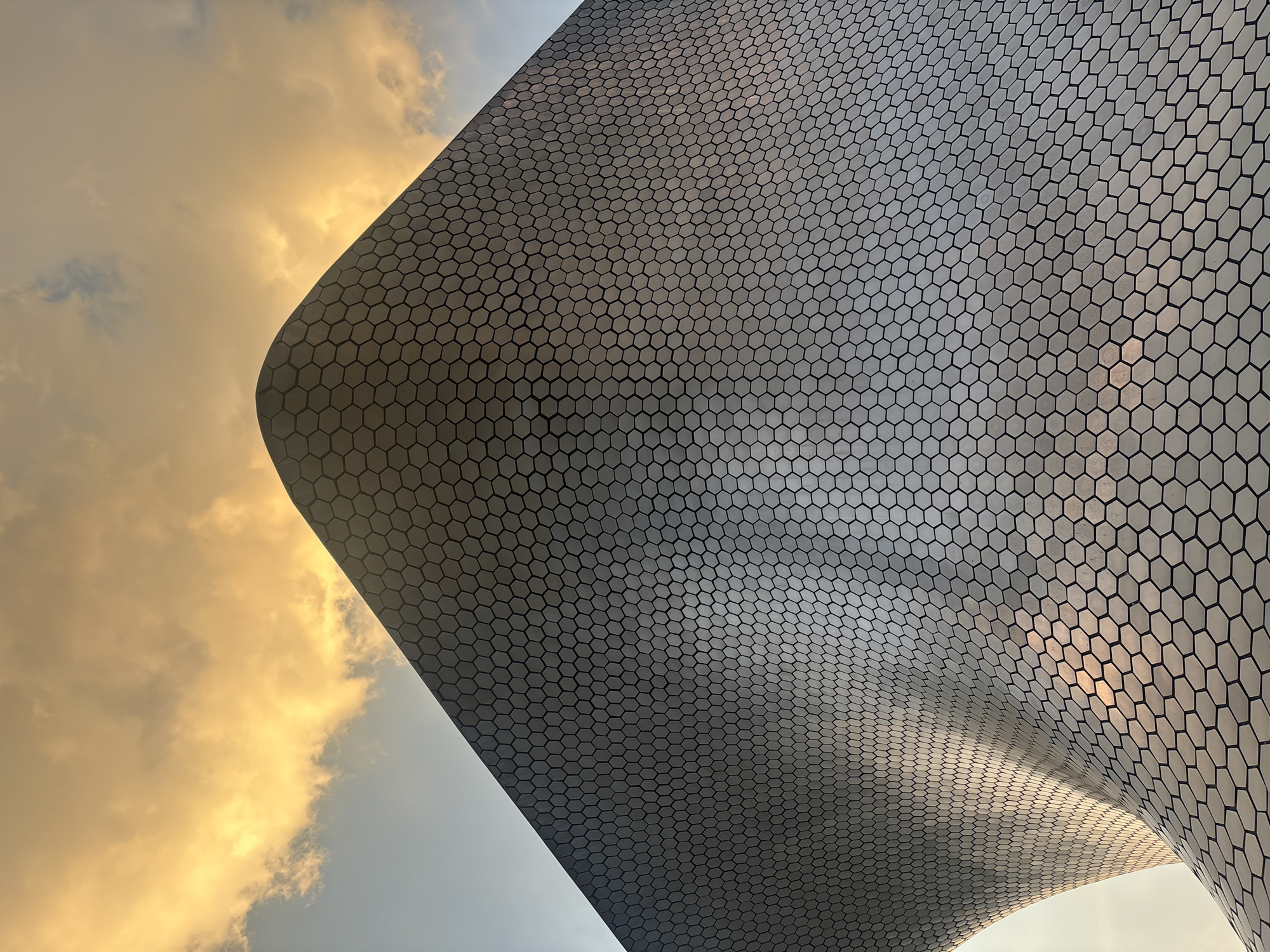 Museo Soumaya photographed from multiple angles during Mexico City dusk