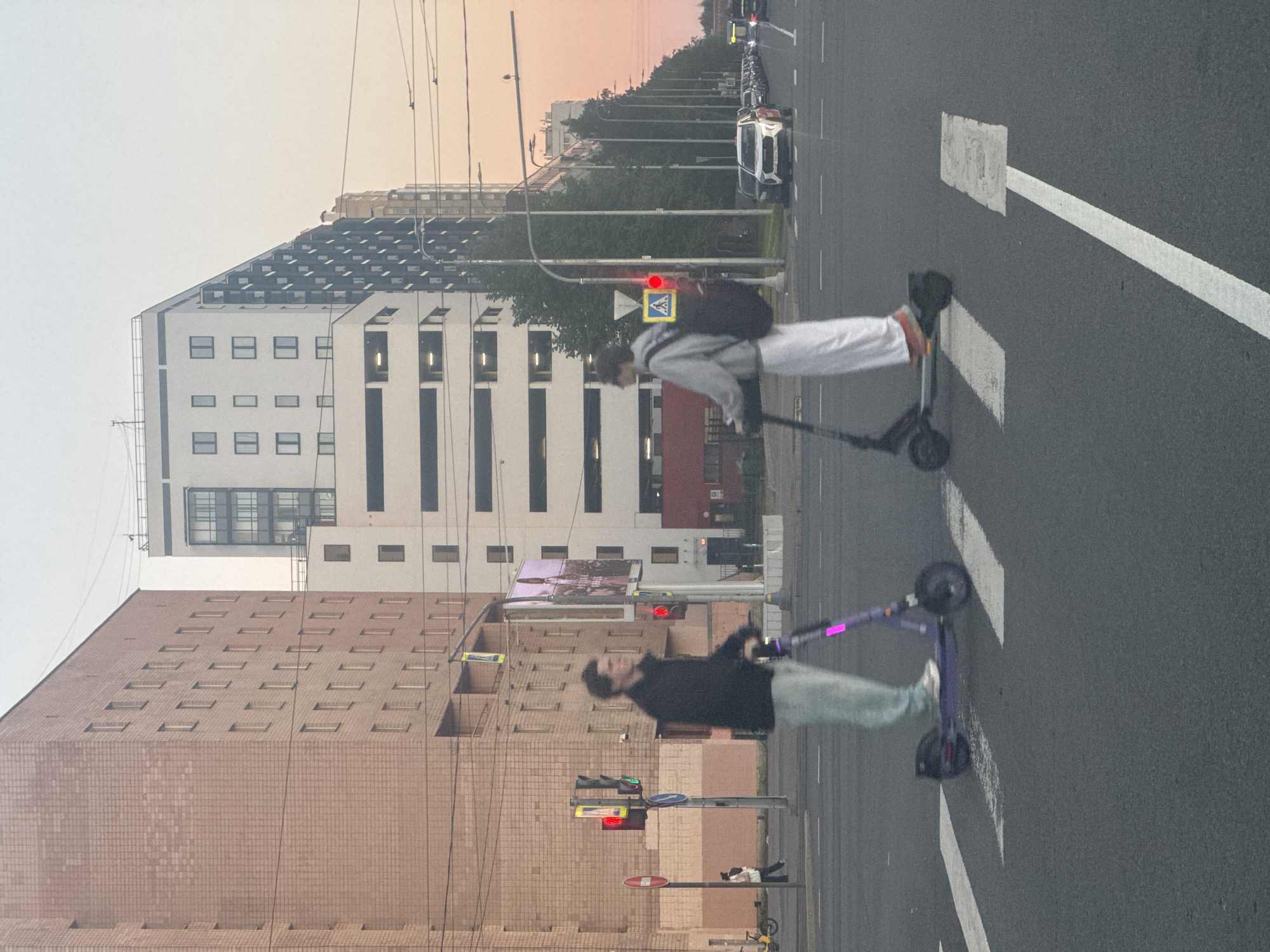 Rush hour street scene at a Saint Petersburg intersection, dusk