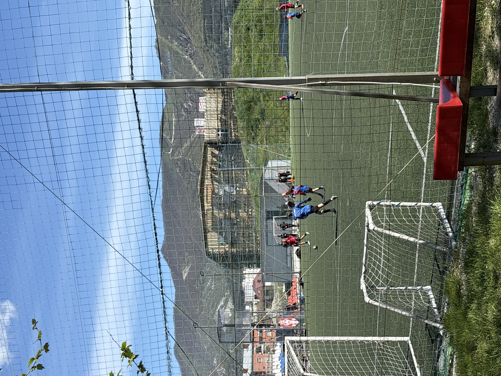 Morning walk through Gelendzhik captures spring blooms, cats, soccer