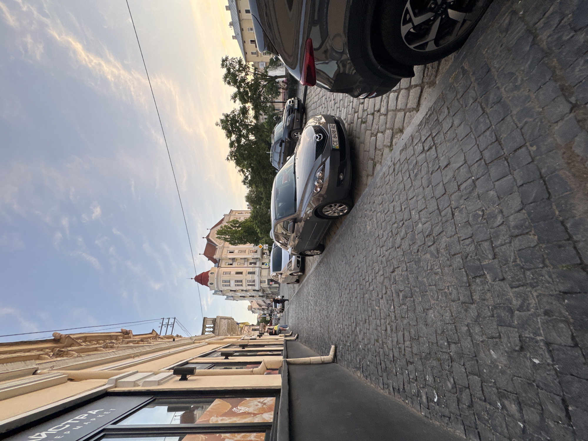 Wandering Chernivtsi's cobblestone streets on a late June afternoon