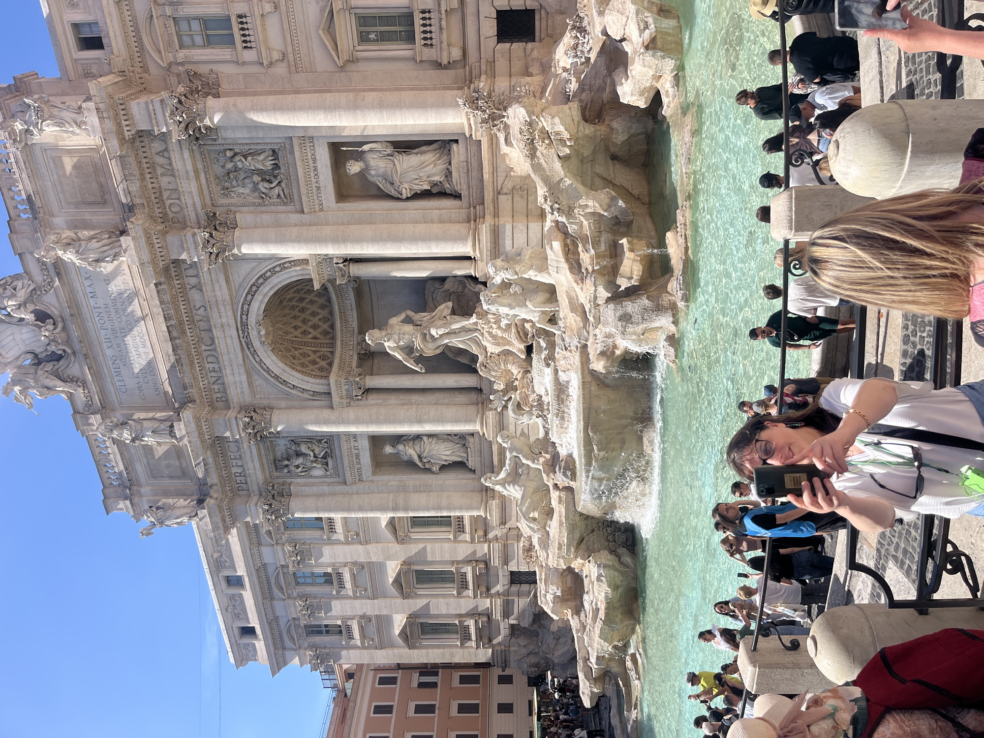 Tourists flock to Trevi Fountain on sunny Rome afternoon