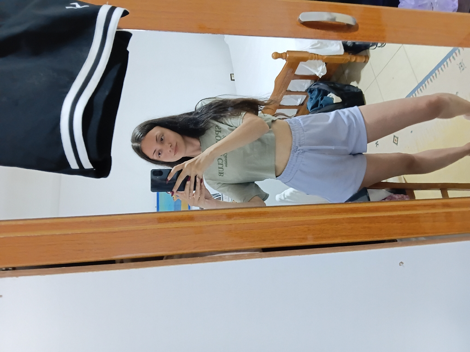 Woman captures selfies and outdoor portraits in Vlora, Albania
