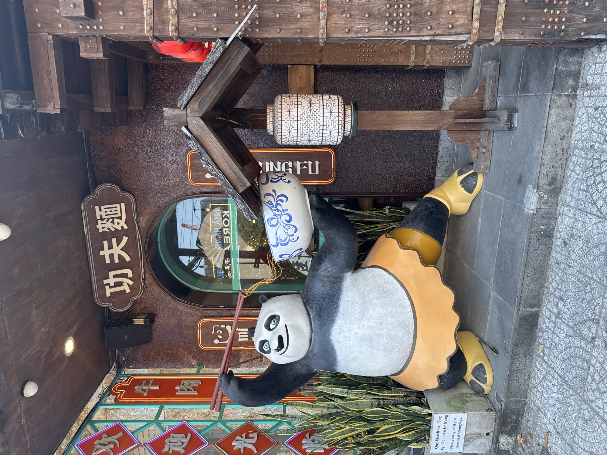 Panda statue with chopsticks spotted outside Đà Nẵng restaurant