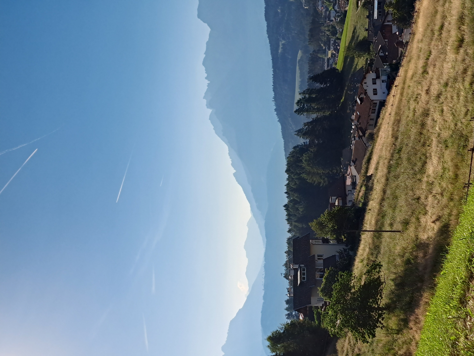 Sunny morning in a European mountain village valley