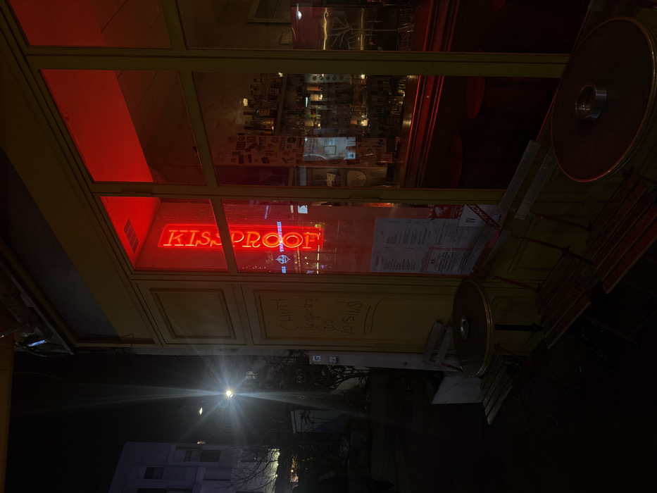 Nighttime Paris street walk captures restaurants, decorations, personal moments