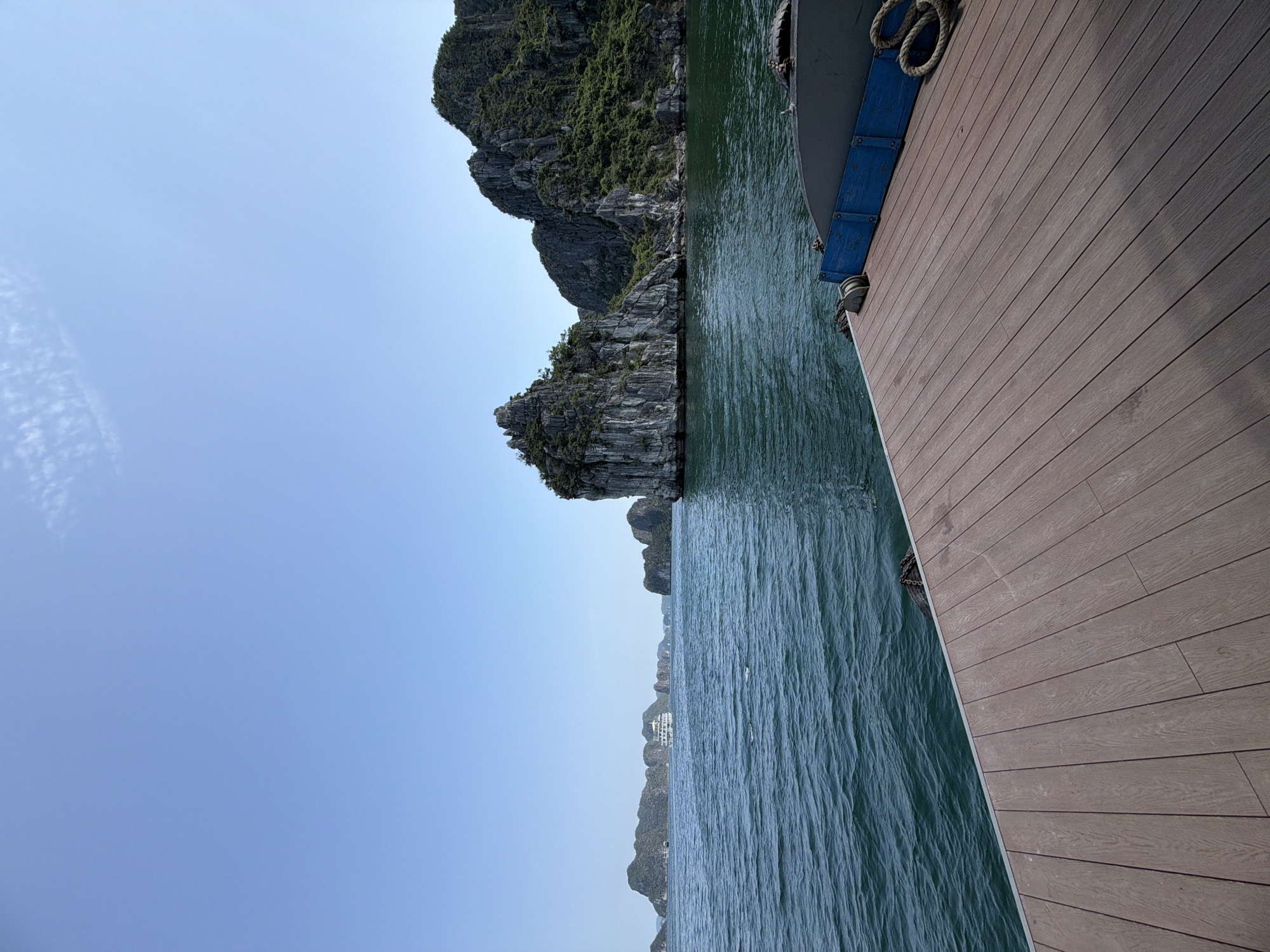 Morning boat tours navigate Ha Long Bay's limestone formations