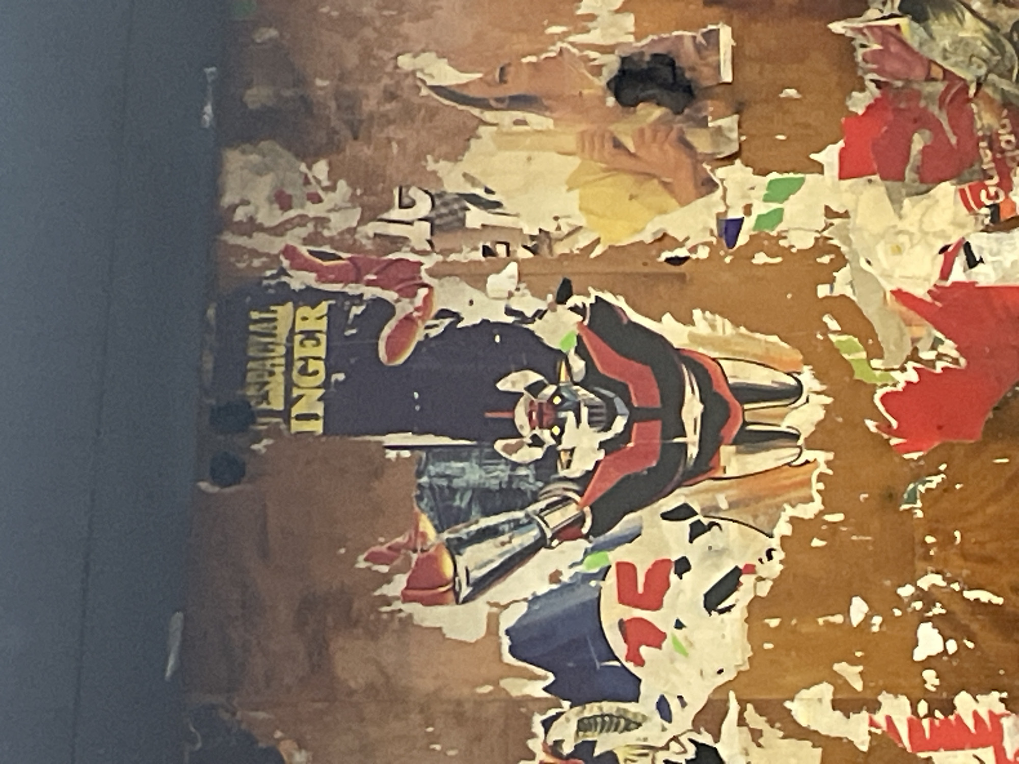 Urban signage and weathered posters documented in Barcelona