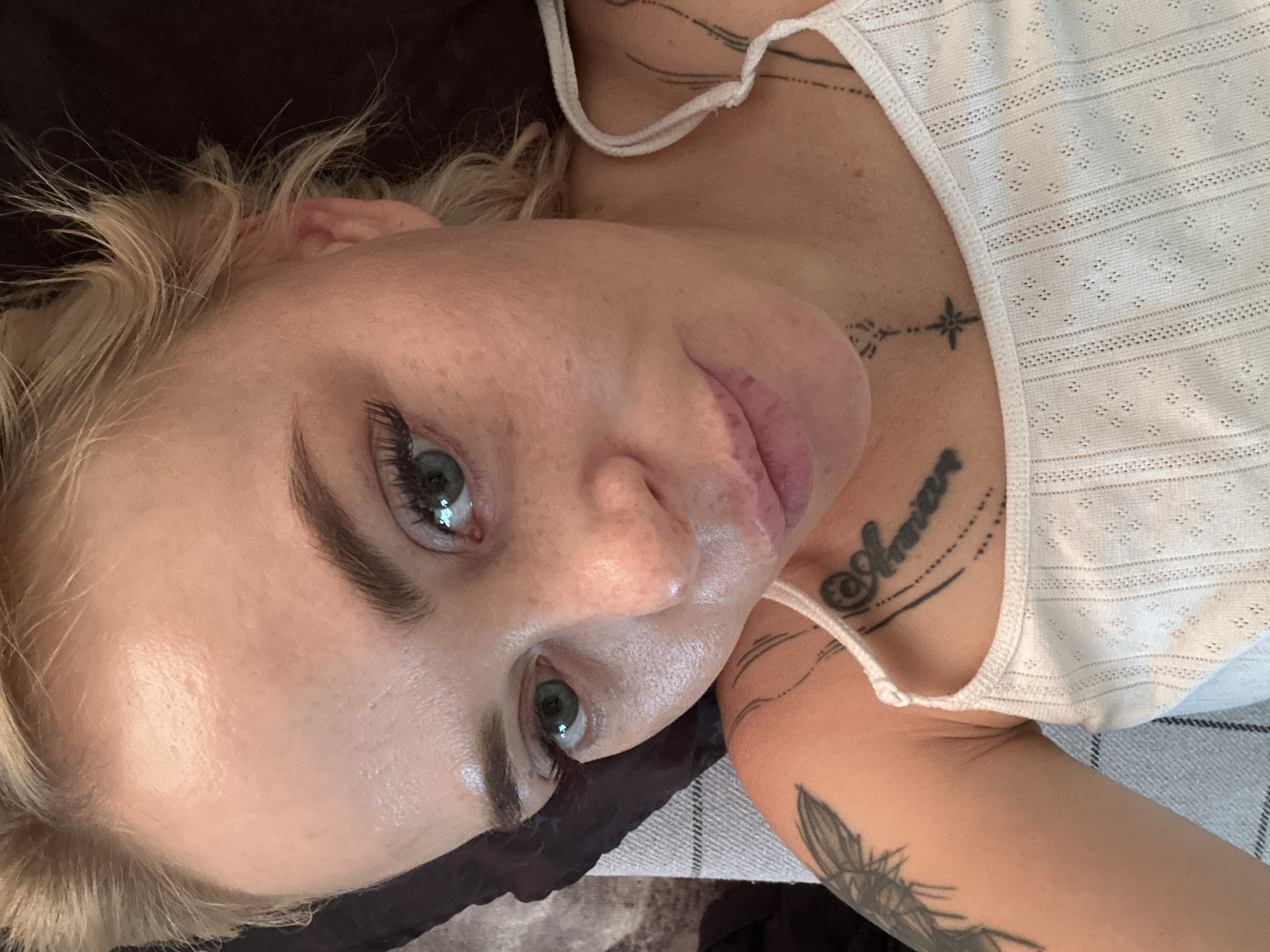 Morning selfie session: blonde woman captures 23 sequential photos