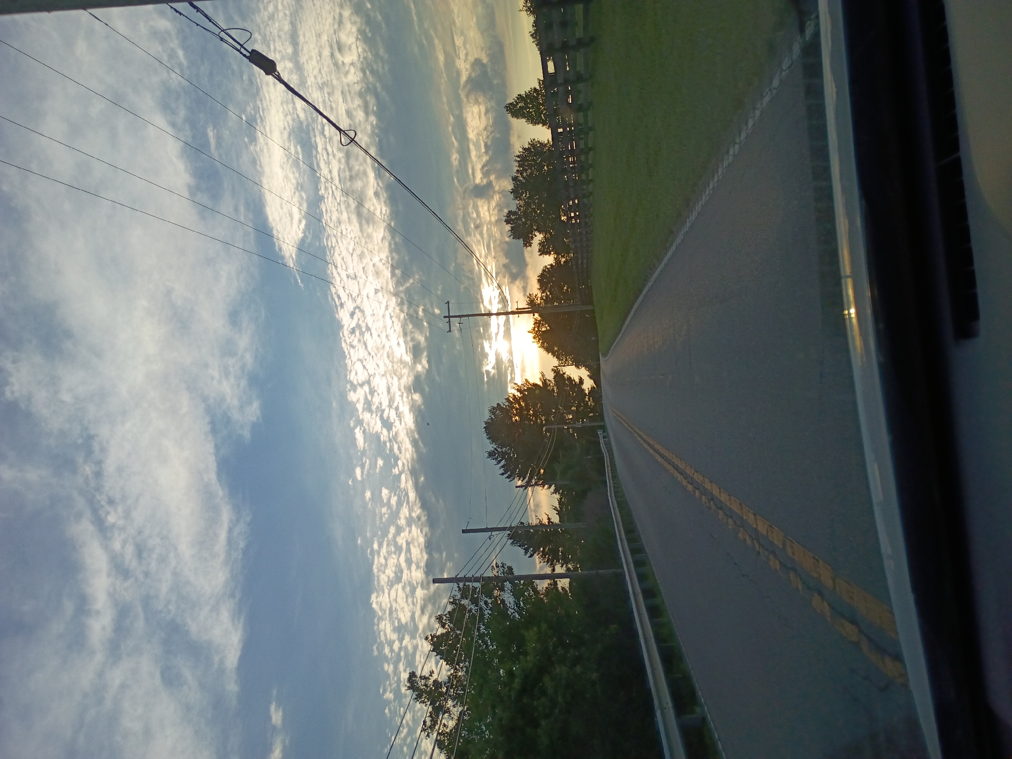 Evening drive through rural Kentucky, fields and open road